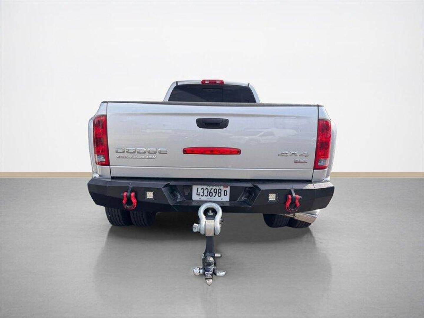 2003 Bright Silver Metallic Clearcoat /Charcoal Dodge Ram 3500 SLT DRW (3D7MU48C23G) with an Cummins 5.9L Diesel Turbo I6 305hp 555ft. lbs. engine, Automatic transmission, located at 25355 Eames Street, Channahon, IL, 60410, (815) 467-1807, 41.429108, -88.228432 - Behold the majestic 2003 Dodge Ram 3500 Quad Cab SLT, a true titan of the road! Powered by the legendary Cummins 5.9L Diesel Turbo I6 engine, this beast roars with 305hp and a jaw-dropping 555ft. lbs. of torque, ready to conquer any challenge that comes its way. Cloaked in a regal Bright Silver Met - Photo#3