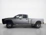 2003 Bright Silver Metallic Clearcoat /Charcoal Dodge Ram 3500 SLT DRW (3D7MU48C23G) with an Cummins 5.9L Diesel Turbo I6 305hp 555ft. lbs. engine, Automatic transmission, located at 25355 Eames Street, Channahon, IL, 60410, (815) 467-1807, 41.429108, -88.228432 - Behold the majestic 2003 Dodge Ram 3500 Quad Cab SLT, a true titan of the road! Powered by the legendary Cummins 5.9L Diesel Turbo I6 engine, this beast roars with 305hp and a jaw-dropping 555ft. lbs. of torque, ready to conquer any challenge that comes its way. Cloaked in a regal Bright Silver Met - Photo#5