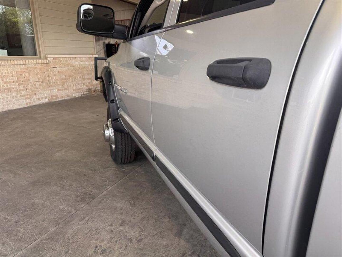 2003 Bright Silver Metallic Clearcoat /Charcoal Dodge Ram 3500 SLT DRW (3D7MU48C23G) with an Cummins 5.9L Diesel Turbo I6 305hp 555ft. lbs. engine, Automatic transmission, located at 25355 Eames Street, Channahon, IL, 60410, (815) 467-1807, 41.429108, -88.228432 - Behold the majestic 2003 Dodge Ram 3500 Quad Cab SLT, a true titan of the road! Powered by the legendary Cummins 5.9L Diesel Turbo I6 engine, this beast roars with 305hp and a jaw-dropping 555ft. lbs. of torque, ready to conquer any challenge that comes its way. Cloaked in a regal Bright Silver Met - Photo#9