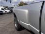 2003 Bright Silver Metallic Clearcoat /Charcoal Dodge Ram 3500 SLT DRW (3D7MU48C23G) with an Cummins 5.9L Diesel Turbo I6 305hp 555ft. lbs. engine, Automatic transmission, located at 25355 Eames Street, Channahon, IL, 60410, (815) 467-1807, 41.429108, -88.228432 - Behold the majestic 2003 Dodge Ram 3500 Quad Cab SLT, a true titan of the road! Powered by the legendary Cummins 5.9L Diesel Turbo I6 engine, this beast roars with 305hp and a jaw-dropping 555ft. lbs. of torque, ready to conquer any challenge that comes its way. Cloaked in a regal Bright Silver Met - Photo#10