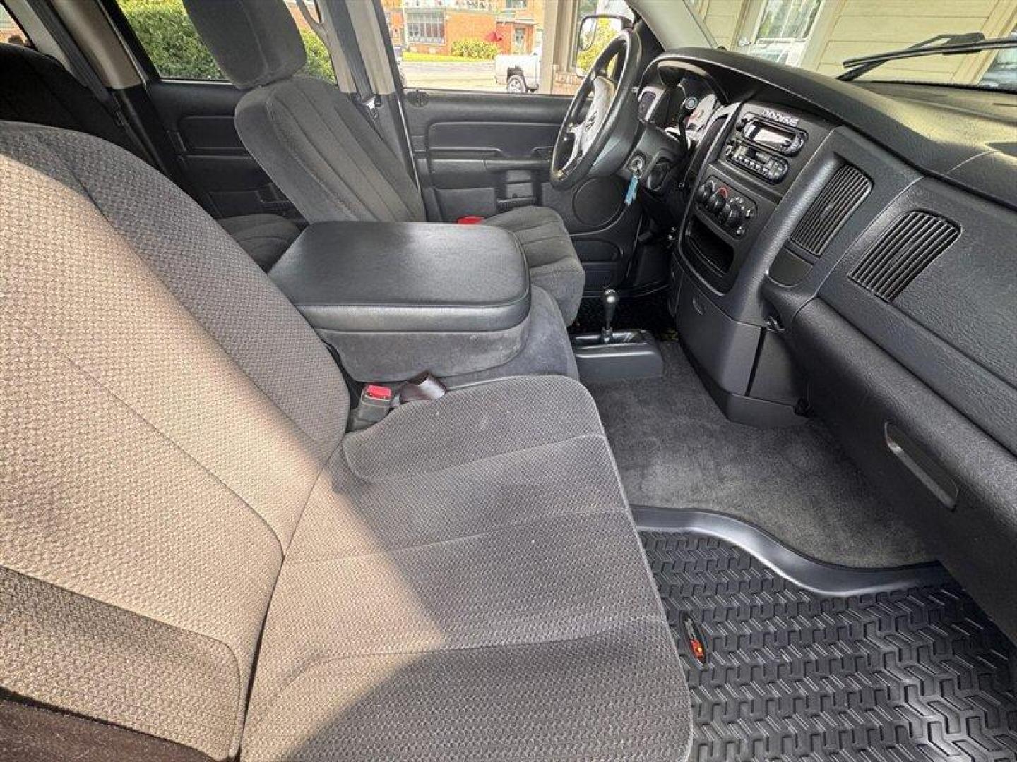 2003 Bright Silver Metallic Clearcoat /Charcoal Dodge Ram 3500 SLT DRW (3D7MU48C23G) with an Cummins 5.9L Diesel Turbo I6 305hp 555ft. lbs. engine, Automatic transmission, located at 25355 Eames Street, Channahon, IL, 60410, (815) 467-1807, 41.429108, -88.228432 - Behold the majestic 2003 Dodge Ram 3500 Quad Cab SLT, a true titan of the road! Powered by the legendary Cummins 5.9L Diesel Turbo I6 engine, this beast roars with 305hp and a jaw-dropping 555ft. lbs. of torque, ready to conquer any challenge that comes its way. Cloaked in a regal Bright Silver Met - Photo#13
