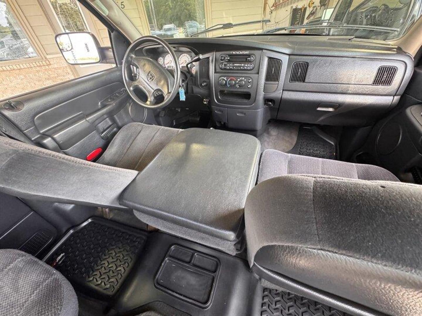2003 Bright Silver Metallic Clearcoat /Charcoal Dodge Ram 3500 SLT DRW (3D7MU48C23G) with an Cummins 5.9L Diesel Turbo I6 305hp 555ft. lbs. engine, Automatic transmission, located at 25355 Eames Street, Channahon, IL, 60410, (815) 467-1807, 41.429108, -88.228432 - Behold the majestic 2003 Dodge Ram 3500 Quad Cab SLT, a true titan of the road! Powered by the legendary Cummins 5.9L Diesel Turbo I6 engine, this beast roars with 305hp and a jaw-dropping 555ft. lbs. of torque, ready to conquer any challenge that comes its way. Cloaked in a regal Bright Silver Met - Photo#15