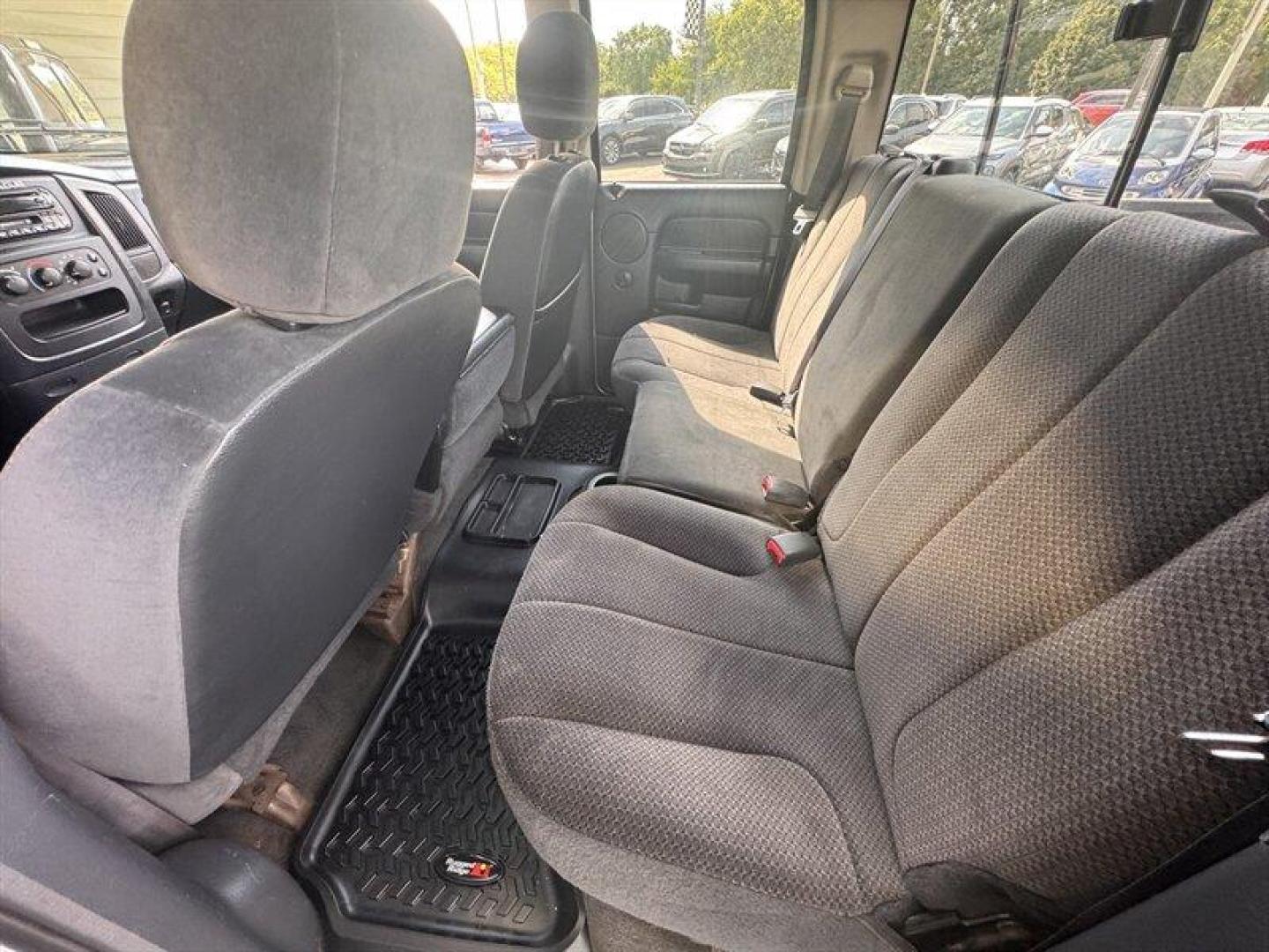 2003 Bright Silver Metallic Clearcoat /Charcoal Dodge Ram 3500 SLT DRW (3D7MU48C23G) with an Cummins 5.9L Diesel Turbo I6 305hp 555ft. lbs. engine, Automatic transmission, located at 25355 Eames Street, Channahon, IL, 60410, (815) 467-1807, 41.429108, -88.228432 - Behold the majestic 2003 Dodge Ram 3500 Quad Cab SLT, a true titan of the road! Powered by the legendary Cummins 5.9L Diesel Turbo I6 engine, this beast roars with 305hp and a jaw-dropping 555ft. lbs. of torque, ready to conquer any challenge that comes its way. Cloaked in a regal Bright Silver Met - Photo#17