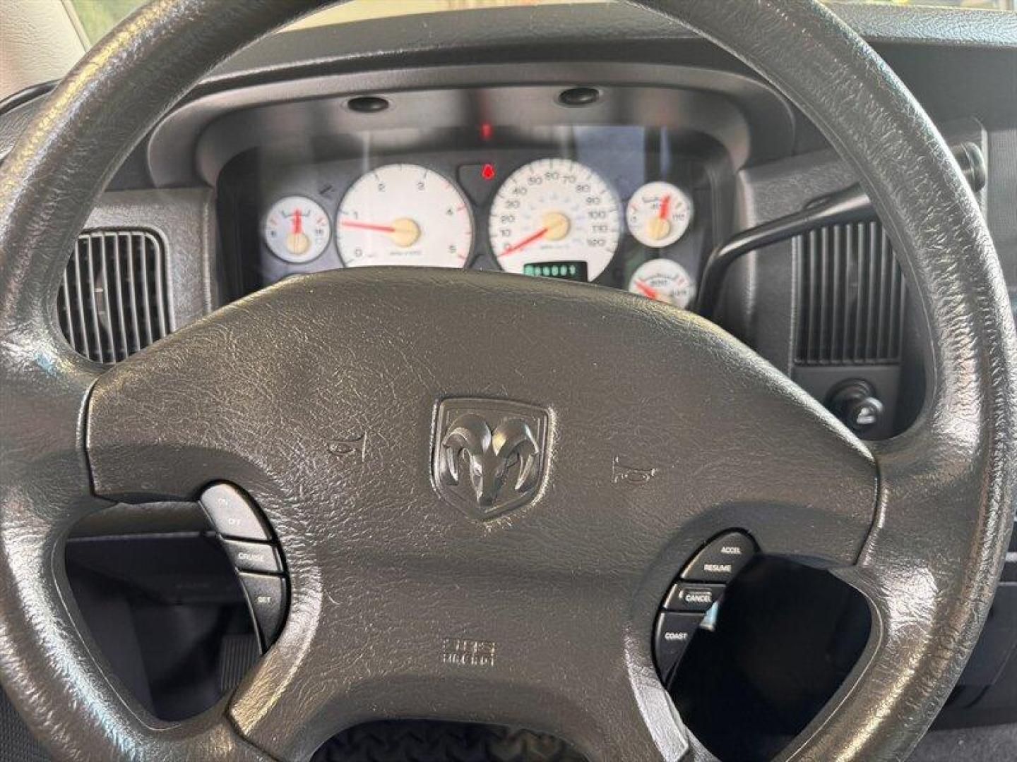 2003 Bright Silver Metallic Clearcoat /Charcoal Dodge Ram 3500 SLT DRW (3D7MU48C23G) with an Cummins 5.9L Diesel Turbo I6 305hp 555ft. lbs. engine, Automatic transmission, located at 25355 Eames Street, Channahon, IL, 60410, (815) 467-1807, 41.429108, -88.228432 - Behold the majestic 2003 Dodge Ram 3500 Quad Cab SLT, a true titan of the road! Powered by the legendary Cummins 5.9L Diesel Turbo I6 engine, this beast roars with 305hp and a jaw-dropping 555ft. lbs. of torque, ready to conquer any challenge that comes its way. Cloaked in a regal Bright Silver Met - Photo#26