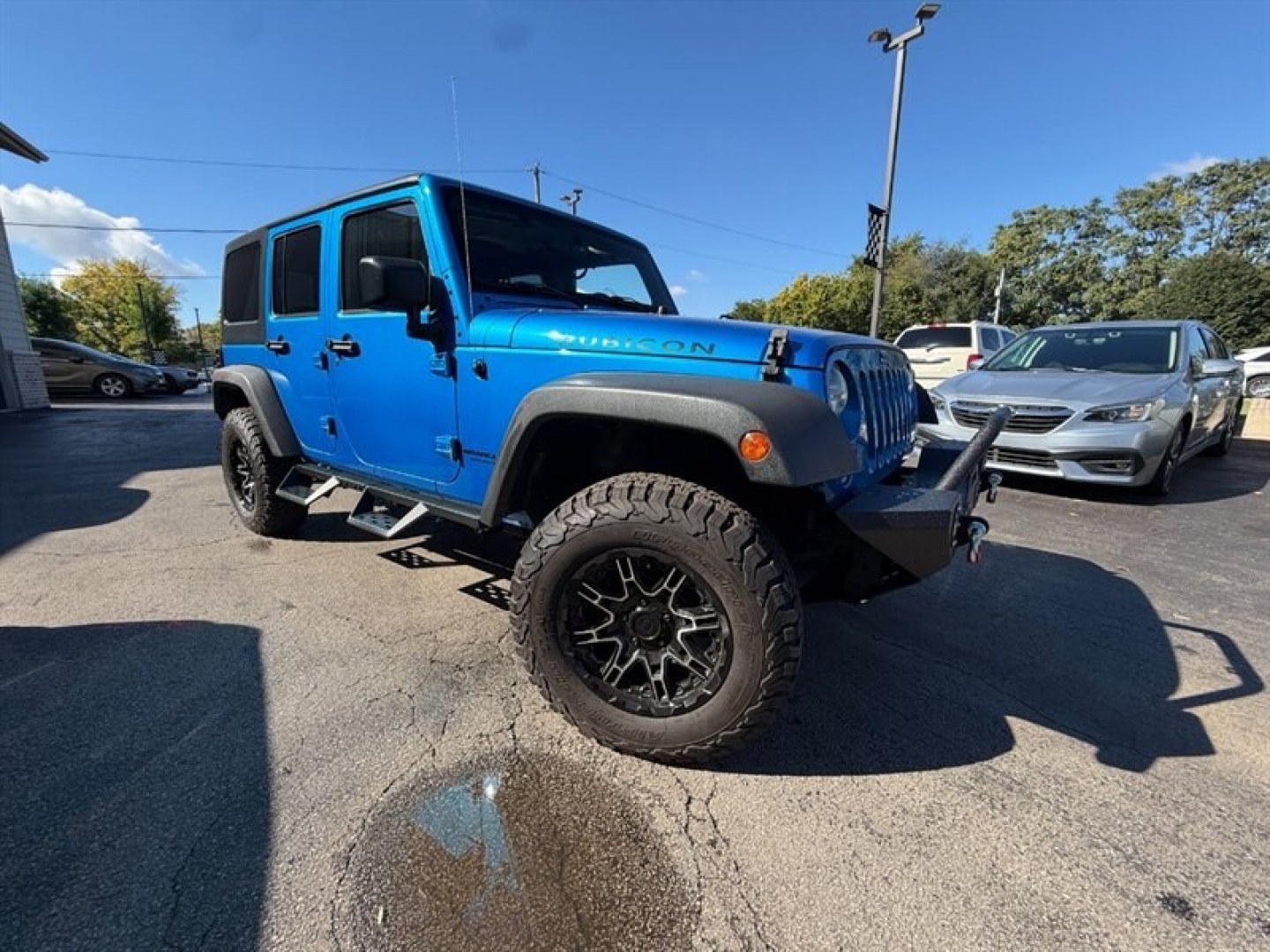 2015 Hydro Blue Pearl Coat Jeep Wrangler Unlimited Rubicon (1C4BJWFG8FL) with an 3.6 engine, Automatic transmission, located at 25355 Eames Street, Channahon, IL, 60410, (815) 467-1807, 41.429108, -88.228432 - Ready to conquer the urban jungle or tackle off-road adventures? Feast your eyes on this 2015 Jeep Wrangler Unlimited Rubicon, dressed to impress in Hydro Blue Pearl Coat because why blend in when you were born to stand out? Under the hood, the fearless 3.6L V6 engine roars to life, delivering ser- Photo#0