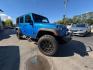 2015 Hydro Blue Pearl Coat Jeep Wrangler Unlimited Rubicon (1C4BJWFG8FL) with an 3.6 engine, Automatic transmission, located at 25355 Eames Street, Channahon, IL, 60410, (815) 467-1807, 41.429108, -88.228432 - Ready to conquer the urban jungle or tackle off-road adventures? Feast your eyes on this 2015 Jeep Wrangler Unlimited Rubicon, dressed to impress in Hydro Blue Pearl Coat because why blend in when you were born to stand out? Under the hood, the fearless 3.6L V6 engine roars to life, delivering ser- Photo#0