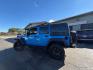 2015 Hydro Blue Pearl Coat Jeep Wrangler Unlimited Rubicon (1C4BJWFG8FL) with an 3.6 engine, Automatic transmission, located at 25355 Eames Street, Channahon, IL, 60410, (815) 467-1807, 41.429108, -88.228432 - Ready to conquer the urban jungle or tackle off-road adventures? Feast your eyes on this 2015 Jeep Wrangler Unlimited Rubicon, dressed to impress in Hydro Blue Pearl Coat because why blend in when you were born to stand out? Under the hood, the fearless 3.6L V6 engine roars to life, delivering ser- Photo#4