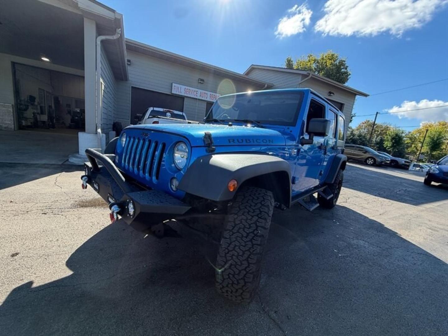 2015 Hydro Blue Pearl Coat Jeep Wrangler Unlimited Rubicon (1C4BJWFG8FL) with an 3.6 engine, Automatic transmission, located at 25355 Eames Street, Channahon, IL, 60410, (815) 467-1807, 41.429108, -88.228432 - Ready to conquer the urban jungle or tackle off-road adventures? Feast your eyes on this 2015 Jeep Wrangler Unlimited Rubicon, dressed to impress in Hydro Blue Pearl Coat because why blend in when you were born to stand out? Under the hood, the fearless 3.6L V6 engine roars to life, delivering ser- Photo#5