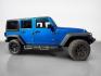 2015 Hydro Blue Pearl Coat Jeep Wrangler Unlimited Unlimited Rubicon (1C4BJWFG8FL) with an 3.6L V6 285hp 260ft. lbs. engine, Automatic transmission, located at 25355 Eames Street, Channahon, IL, 60410, (815) 467-1807, 41.429108, -88.228432 - Ready to conquer the concrete jungle *and* the off-road trails? Feast your eyes on this 2015 Jeep Wrangler Unlimited Rubicon in a show-stopping Hydro Blue Pearl Coat that screams adventure with a splash of style. Under the hood? A beastly 3.6L V6 engine flexing 285 horsepower and 260 lb-ft of torque- Photo#1