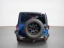 2015 Hydro Blue Pearl Coat Jeep Wrangler Unlimited Unlimited Rubicon (1C4BJWFG8FL) with an 3.6L V6 285hp 260ft. lbs. engine, Automatic transmission, located at 25355 Eames Street, Channahon, IL, 60410, (815) 467-1807, 41.429108, -88.228432 - Ready to conquer the concrete jungle *and* the off-road trails? Feast your eyes on this 2015 Jeep Wrangler Unlimited Rubicon in a show-stopping Hydro Blue Pearl Coat that screams adventure with a splash of style. Under the hood? A beastly 3.6L V6 engine flexing 285 horsepower and 260 lb-ft of torque- Photo#3