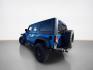 2015 Hydro Blue Pearl Coat Jeep Wrangler Unlimited Unlimited Rubicon (1C4BJWFG8FL) with an 3.6L V6 285hp 260ft. lbs. engine, Automatic transmission, located at 25355 Eames Street, Channahon, IL, 60410, (815) 467-1807, 41.429108, -88.228432 - Ready to conquer the concrete jungle *and* the off-road trails? Feast your eyes on this 2015 Jeep Wrangler Unlimited Rubicon in a show-stopping Hydro Blue Pearl Coat that screams adventure with a splash of style. Under the hood? A beastly 3.6L V6 engine flexing 285 horsepower and 260 lb-ft of torque- Photo#4