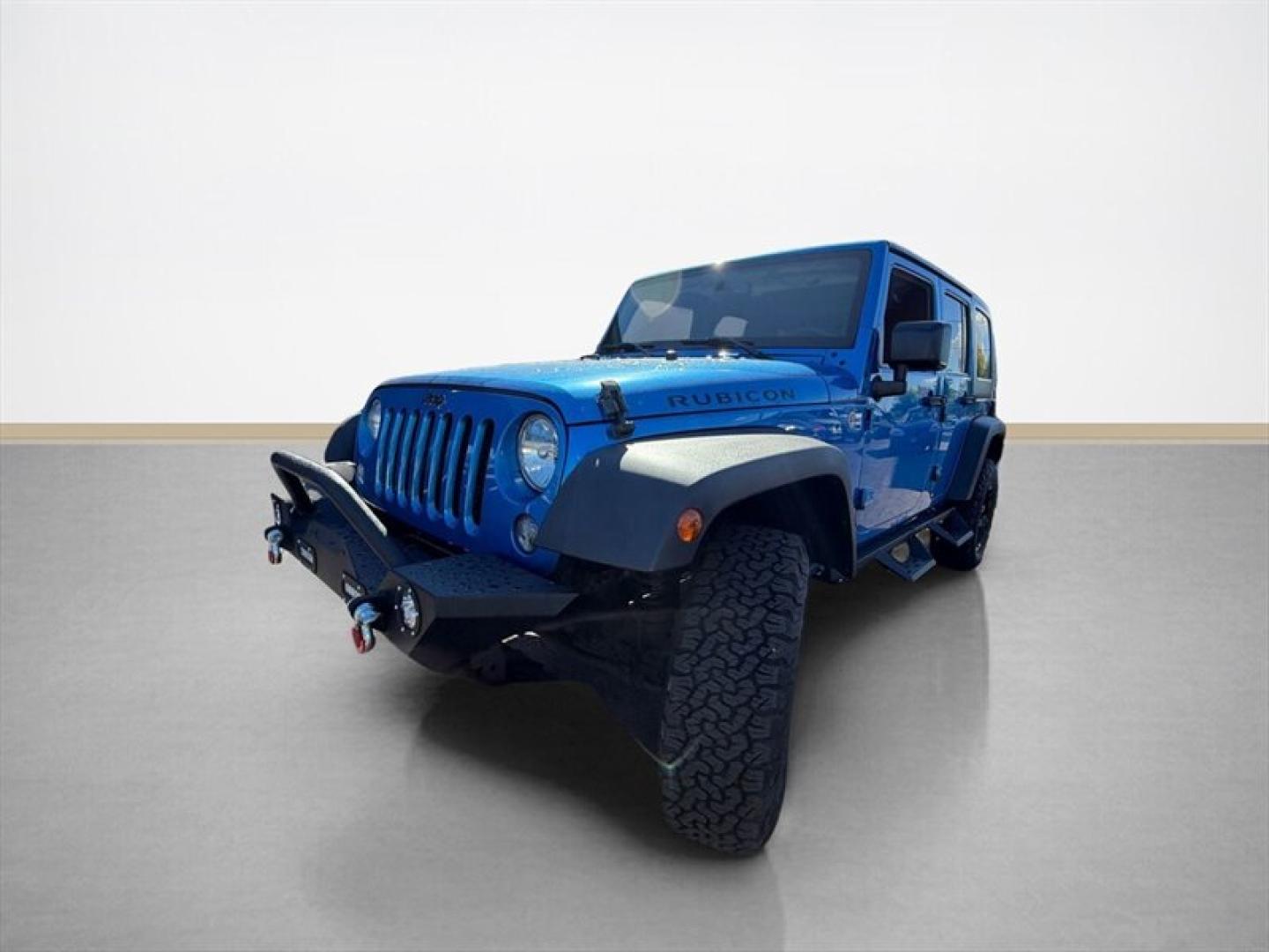 2015 Hydro Blue Pearl Coat Jeep Wrangler Unlimited Unlimited Rubicon (1C4BJWFG8FL) with an 3.6L V6 285hp 260ft. lbs. engine, Automatic transmission, located at 25355 Eames Street, Channahon, IL, 60410, (815) 467-1807, 41.429108, -88.228432 - Ready to conquer the concrete jungle *and* the off-road trails? Feast your eyes on this 2015 Jeep Wrangler Unlimited Rubicon in a show-stopping Hydro Blue Pearl Coat that screams adventure with a splash of style. Under the hood? A beastly 3.6L V6 engine flexing 285 horsepower and 260 lb-ft of torque- Photo#6