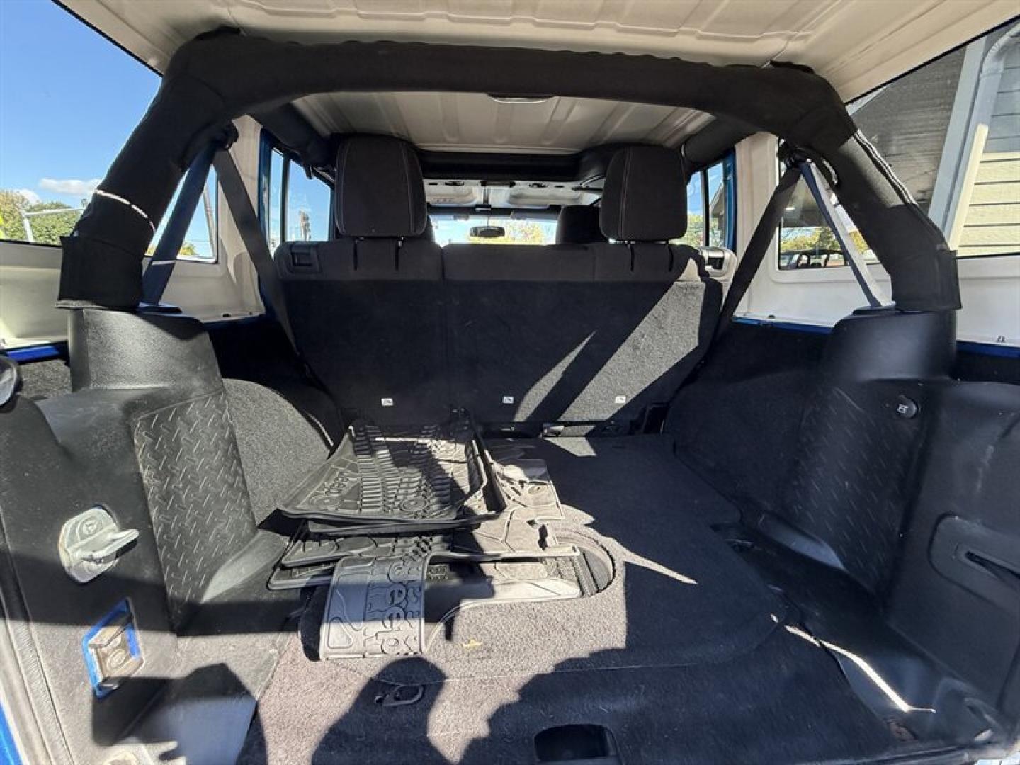 2015 Hydro Blue Pearl Coat Jeep Wrangler Unlimited Unlimited Rubicon (1C4BJWFG8FL) with an 3.6L V6 285hp 260ft. lbs. engine, Automatic transmission, located at 25355 Eames Street, Channahon, IL, 60410, (815) 467-1807, 41.429108, -88.228432 - Ready to conquer the concrete jungle *and* the off-road trails? Feast your eyes on this 2015 Jeep Wrangler Unlimited Rubicon in a show-stopping Hydro Blue Pearl Coat that screams adventure with a splash of style. Under the hood? A beastly 3.6L V6 engine flexing 285 horsepower and 260 lb-ft of torque- Photo#12