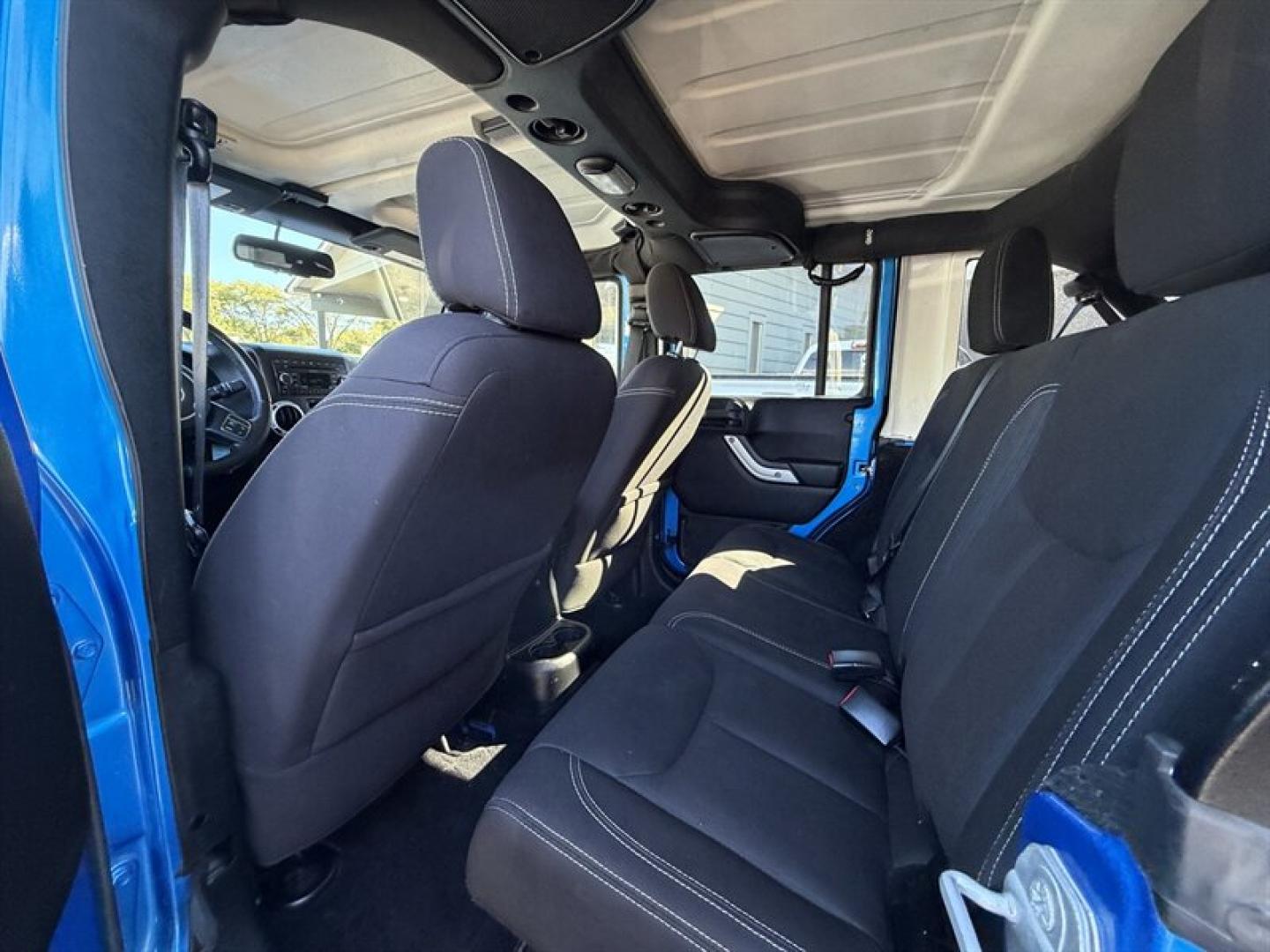 2015 Hydro Blue Pearl Coat Jeep Wrangler Unlimited Unlimited Rubicon (1C4BJWFG8FL) with an 3.6L V6 285hp 260ft. lbs. engine, Automatic transmission, located at 25355 Eames Street, Channahon, IL, 60410, (815) 467-1807, 41.429108, -88.228432 - Ready to conquer the concrete jungle *and* the off-road trails? Feast your eyes on this 2015 Jeep Wrangler Unlimited Rubicon in a show-stopping Hydro Blue Pearl Coat that screams adventure with a splash of style. Under the hood? A beastly 3.6L V6 engine flexing 285 horsepower and 260 lb-ft of torque- Photo#13