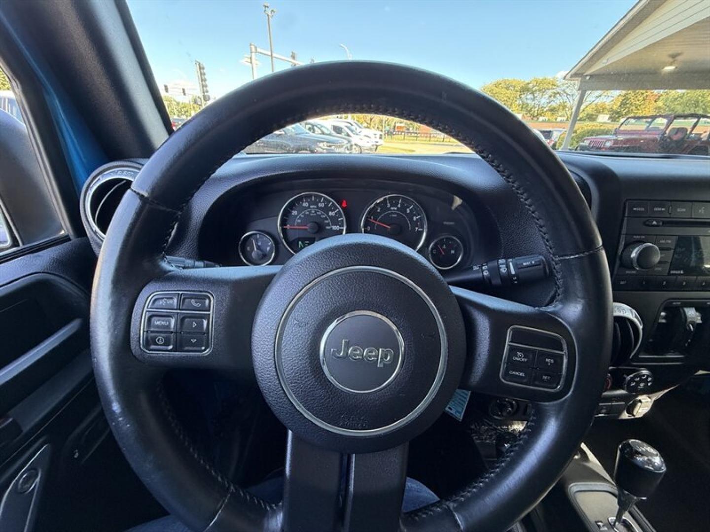 2015 Hydro Blue Pearl Coat Jeep Wrangler Unlimited Unlimited Rubicon (1C4BJWFG8FL) with an 3.6L V6 285hp 260ft. lbs. engine, Automatic transmission, located at 25355 Eames Street, Channahon, IL, 60410, (815) 467-1807, 41.429108, -88.228432 - Ready to conquer the concrete jungle *and* the off-road trails? Feast your eyes on this 2015 Jeep Wrangler Unlimited Rubicon in a show-stopping Hydro Blue Pearl Coat that screams adventure with a splash of style. Under the hood? A beastly 3.6L V6 engine flexing 285 horsepower and 260 lb-ft of torque- Photo#18