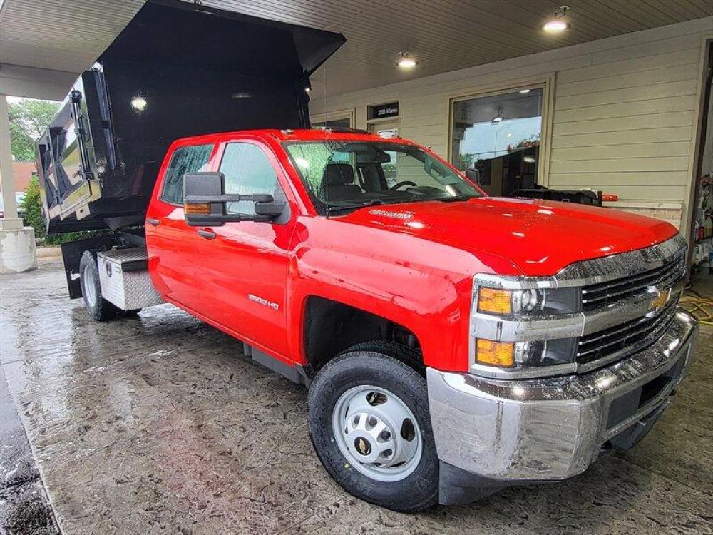 2015 Red Chevrolet Silverado 3500HD CC Work Truck (1GB4KYC8XFF) with an Duramax 6.6L Diesel Turbo V8 397hp 765ft. lbs. engine, Automatic transmission, located at 25355 Eames Street, Channahon, IL, 60410, (815) 467-1807, 41.429108, -88.228432 - ** 9 FOOT DUMP BODY WITH SIDE DOOR and STEPS, PULL OUT RAMP AS WELL. FULLY SERVICED, 6 BRAND NEW TIRES , and BRAND NEW BRAKES. **Auto, all power, tilt, cruise, a/c, alloy wheels, keyless entry and more! If youre ready for a different, no hassle and pleasant car buying experience, then give us a - Photo #0