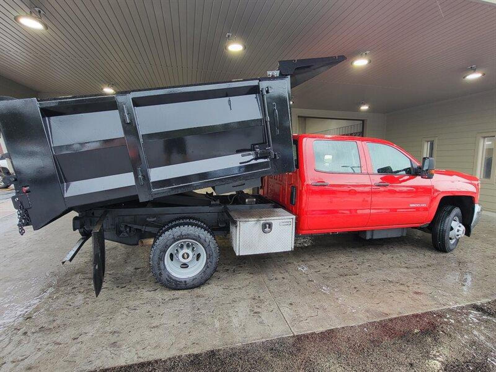 2015 Red Chevrolet Silverado 3500HD CC Work Truck (1GB4KYC8XFF) with an Duramax 6.6L Diesel engine, Automatic transmission, located at 25355 Eames Street, Channahon, IL, 60410, (815) 467-1807, 41.429108, -88.228432 - ** 9 FOOT DUMP BODY WITH SIDE DOOR and STEPS, PULL OUT RAMP AS WELL. FULLY SERVICED, 6 BRAND NEW TIRES , and BRAND NEW BRAKES. **Auto, all power, tilt, cruise, a/c, alloy wheels, keyless entry and more! If youre ready for a different, no hassle and pleasant car buying experience, then give us a - Photo #3