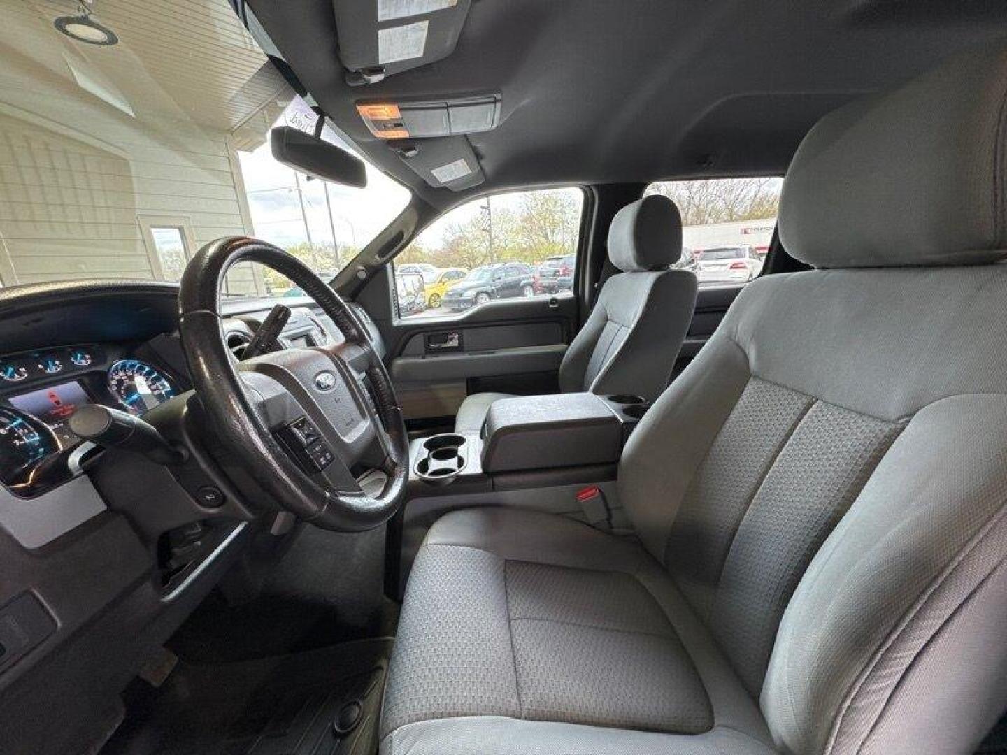 2013 Green Gem Metallic Ford F-150 XLT (1FTFW1EF8DF) with an 5.0 engine, Automatic transmission, located at 25355 Eames Street, Channahon, IL, 60410, (815) 467-1807, 41.429108, -88.228432 - Looking for a reliable and powerful truck? Check out this 2013 Ford F-150 XLT with a robust 5.0 engine that offers both strength and efficiency. With its low mileage of below 90,000 miles, averaging less than 7,000 miles per year, this truck is ready to hit the road for many more adventures. The fa - Photo#13