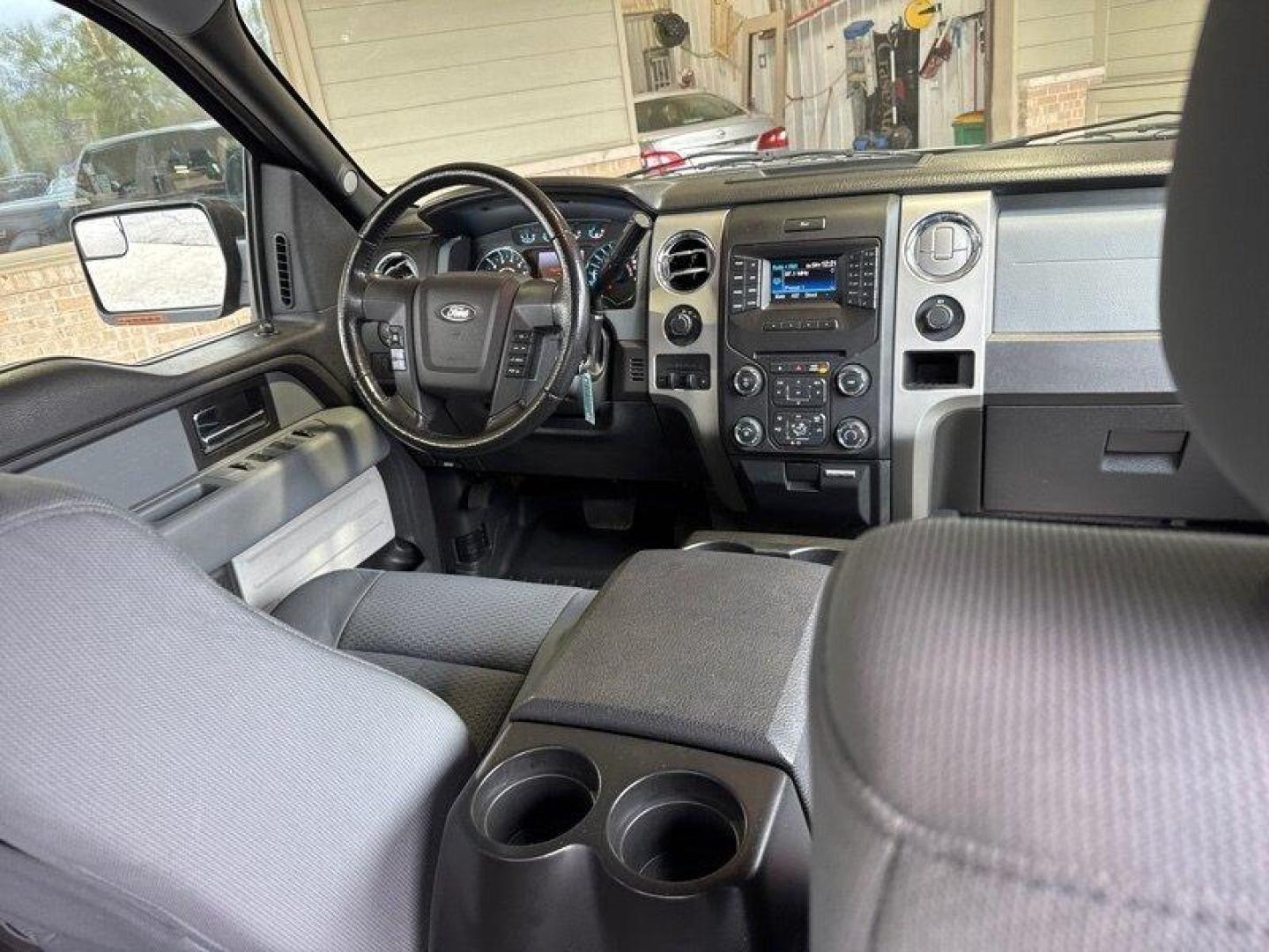 2013 Green Gem Metallic Ford F-150 XLT (1FTFW1EF8DF) with an 5.0 engine, Automatic transmission, located at 25355 Eames Street, Channahon, IL, 60410, (815) 467-1807, 41.429108, -88.228432 - Looking for a reliable and powerful truck? Check out this 2013 Ford F-150 XLT with a robust 5.0 engine that offers both strength and efficiency. With its low mileage of below 90,000 miles, averaging less than 7,000 miles per year, this truck is ready to hit the road for many more adventures. The fa - Photo#17