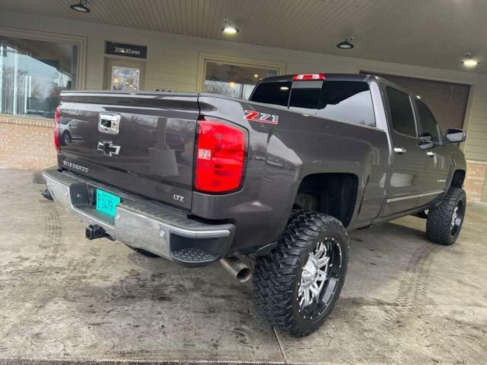 2015 Tungsten Metallic Chevrolet Silverado 1500 LTZ Crew Cab (3GCPCSEC1FG) with an EcoTec3 5.3L V8 355hp 383ft. lbs. engine, Automatic transmission, located at 25355 Eames Street, Channahon, IL, 60410, (815) 467-1807, 41.429108, -88.228432 - CLEAN LOW MILE LTZ Z71! HEATED AND COOLED LEATHER! NAVI! BACK UP CAMERA! REMOTE START! LIFTED WITH AFTERMARKET RIMS AND POWER BOARDS! Auto, all power, tilt, cruise, a/c, alloy wheels, keyless entry and more! If youre ready for a different, no hassle and pleasant car buying experience, then give us a - Photo #2