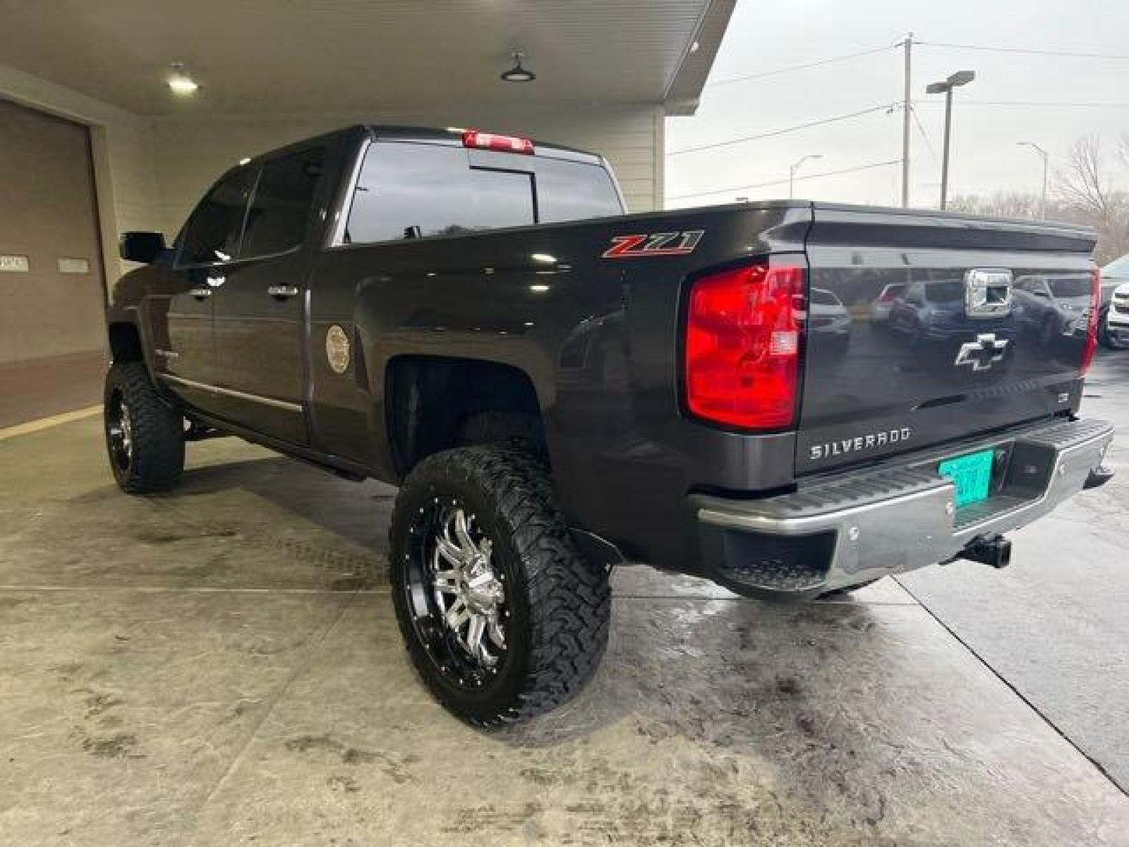 2015 Tungsten Metallic Chevrolet Silverado 1500 LTZ Crew Cab (3GCPCSEC1FG) with an EcoTec3 5.3L V8 355hp 383ft. lbs. engine, Automatic transmission, located at 25355 Eames Street, Channahon, IL, 60410, (815) 467-1807, 41.429108, -88.228432 - CLEAN LOW MILE LTZ Z71! HEATED AND COOLED LEATHER! NAVI! BACK UP CAMERA! REMOTE START! LIFTED WITH AFTERMARKET RIMS AND POWER BOARDS! Auto, all power, tilt, cruise, a/c, alloy wheels, keyless entry and more! If youre ready for a different, no hassle and pleasant car buying experience, then give us a - Photo #4