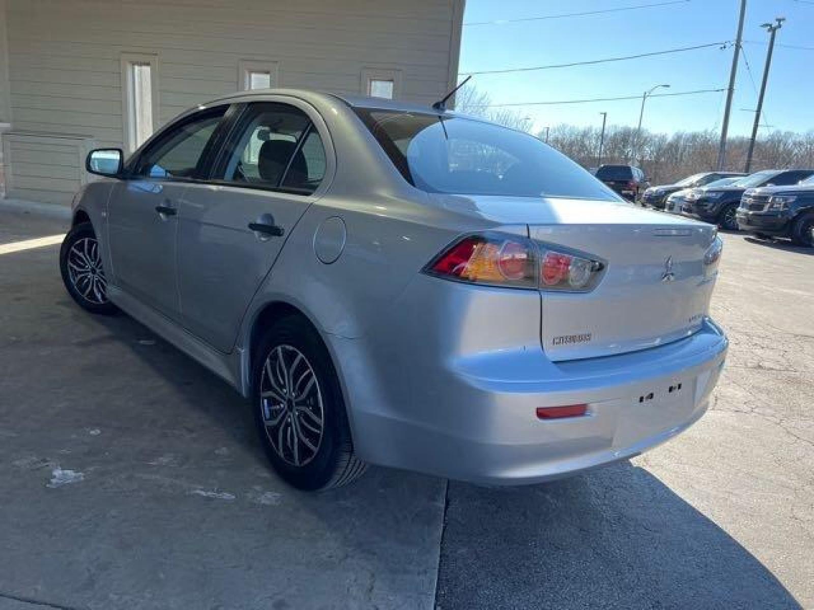 2010 Tarmac Black Pearl Mitsubishi Lancer DE (JA32U1FU2AU) with an 2.0L I4 152hp 146ft. lbs. engine, Automatic transmission, located at 25355 Eames Street, Channahon, IL, 60410, (815) 467-1807, 41.429108, -88.228432 - Auto, all power, tilt, cruise, a/c, alloy wheels, keyless entry and more! If you're ready for a different, no hassle and pleasant car buying experience, then give us a chance! We're breaking the standard Car Sales mold and making one of our very own you'll be sure to appreciate! So, why buy from Cra - Photo #5