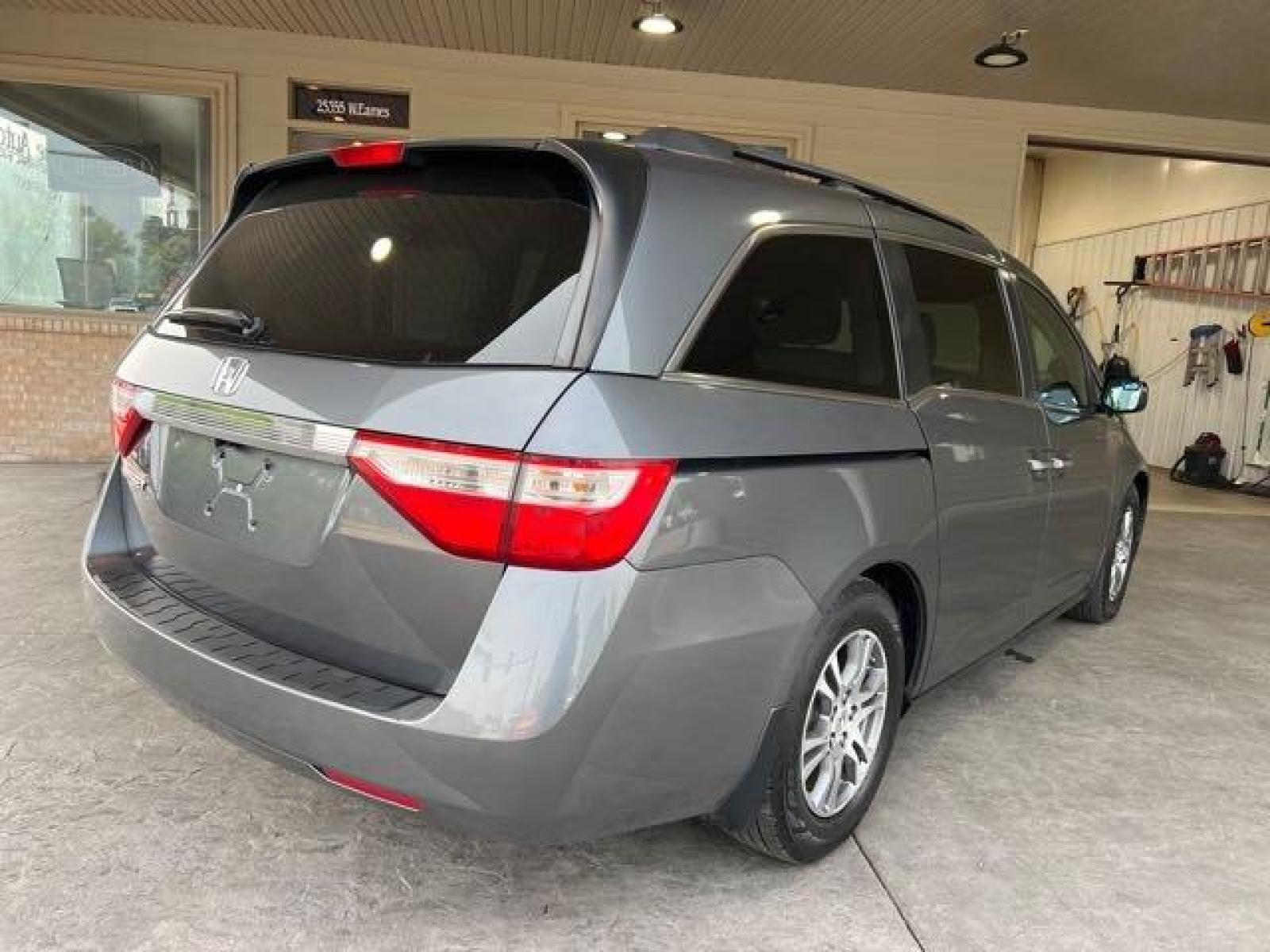 2013 Polished Metal Metallic Honda Odyssey EX-L (5FNRL5H68DB) with an 3.5L V6 248hp 250ft. engine, Automatic transmission, located at 25355 Eames Street, Channahon, IL, 60410, (815) 467-1807, 41.429108, -88.228432 - CLEAN LOCAL TRADE! DVD! HEATED LEATHER! SUNROOF! BACK UP CAMREA! *3 MONTH/3,000 MILE WARRANTY INCLUDED* If you're ready for a different, no hassle and pleasant car buying experience, then give us a chance! We're breaking the standard Car Sales mold and making one of our very own you'll be sure to ap - Photo #2