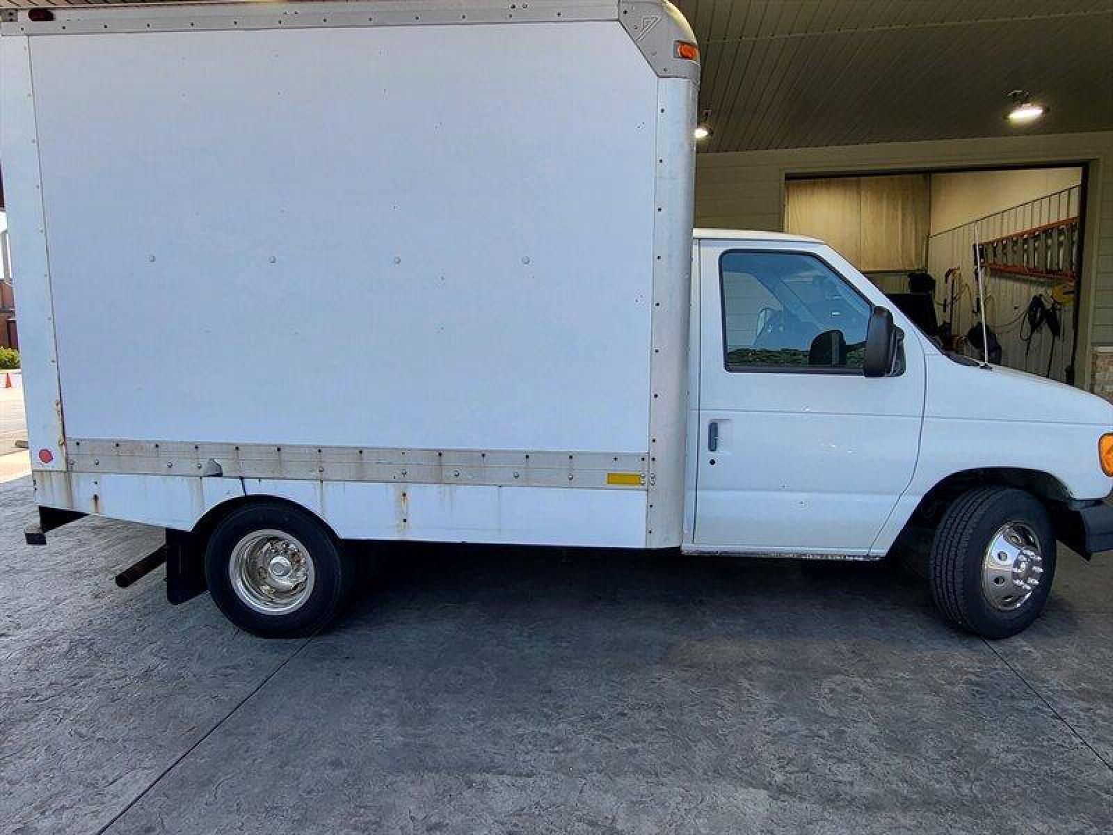 2003 White Ford E-Series Van Standard Cutaway (1FDWE35L03H) with an 5.4 V8 engine, Automatic transmission, located at 25355 Eames Street, Channahon, IL, 60410, (815) 467-1807, 41.429108, -88.228432 - ** 10 FOOT BOX TRUCK PRICED TO MOVE. ** BOX DIMENSIONS 10 FOOT LONG X 94 INCES WIDE X 80 INCHES TALL. RUNS AND DRIVES, NEEDS EXHAUST WORK, CAT CONVERTERS, REAR OVERHEAD DOOR WORKS BUT A LITTLE ROUGH. If you're ready for a different, no hassle and pleasant car buying experience, then give us a chanc - Photo #2