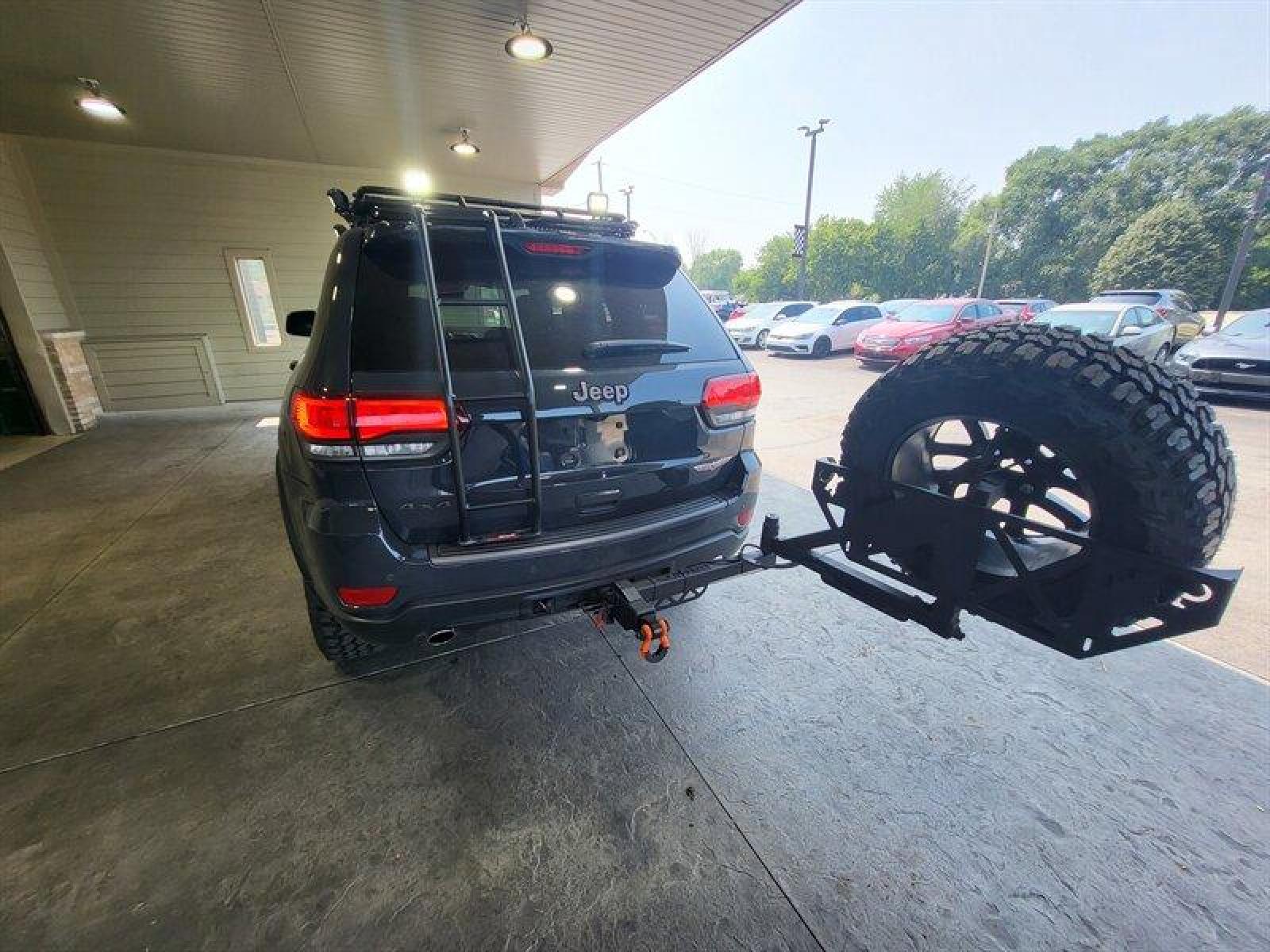 2018 Granite Crystal Metallic Clear Coat Jeep Grand Cherokee Trailhawk (1C4RJFLG3JC) with an Pentastar 3.6L V6 29 engine, Automatic transmission, located at 25355 Eames Street, Channahon, IL, 60410, (815) 467-1807, 41.429108, -88.228432 - ** WOW LOOK AT THIS JEEP, WELL OVER $7,000 IN UPGRADES. 6 MONKEYS TIRE SWING, GOBI STEALTH RACK AND LADDER, ARB COMBINATION BUMPER, WARN M8000 WINCH, PLUS MUCH MORE. 5 BRAND NEW TIRES AS WELL. ** If you're ready for a different, no hassle and pleasant car buying experience, then give us a chance! We - Photo #16