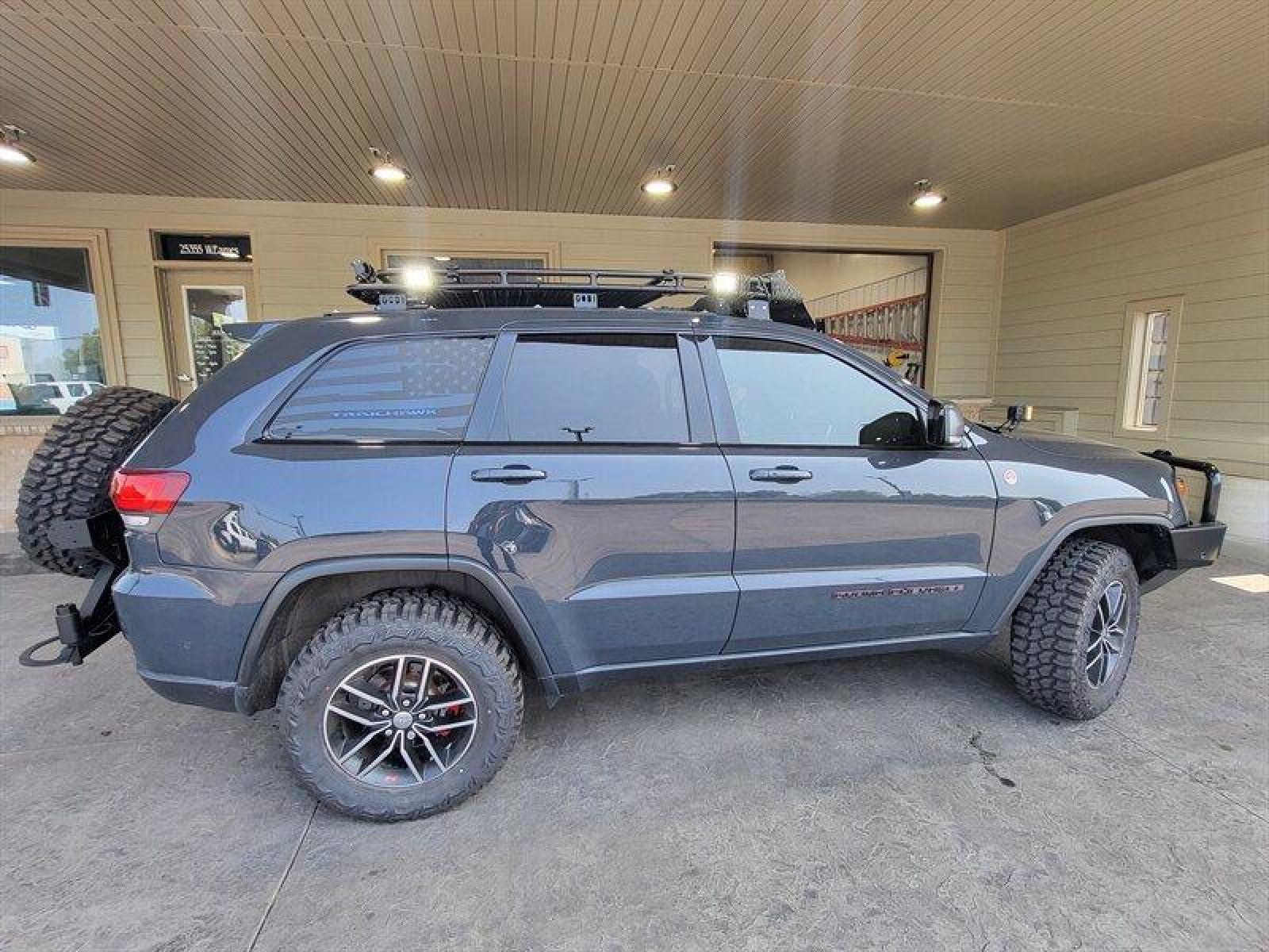 2018 Granite Crystal Metallic Clear Coat Jeep Grand Cherokee Trailhawk (1C4RJFLG3JC) with an Pentastar 3.6L V6 29 engine, Automatic transmission, located at 25355 Eames Street, Channahon, IL, 60410, (815) 467-1807, 41.429108, -88.228432 - ** WOW LOOK AT THIS JEEP, WELL OVER $7,000 IN UPGRADES. 6 MONKEYS TIRE SWING, GOBI STEALTH RACK AND LADDER, ARB COMBINATION BUMPER, WARN M8000 WINCH, PLUS MUCH MORE. 5 BRAND NEW TIRES AS WELL. ** If you're ready for a different, no hassle and pleasant car buying experience, then give us a chance! We - Photo #5