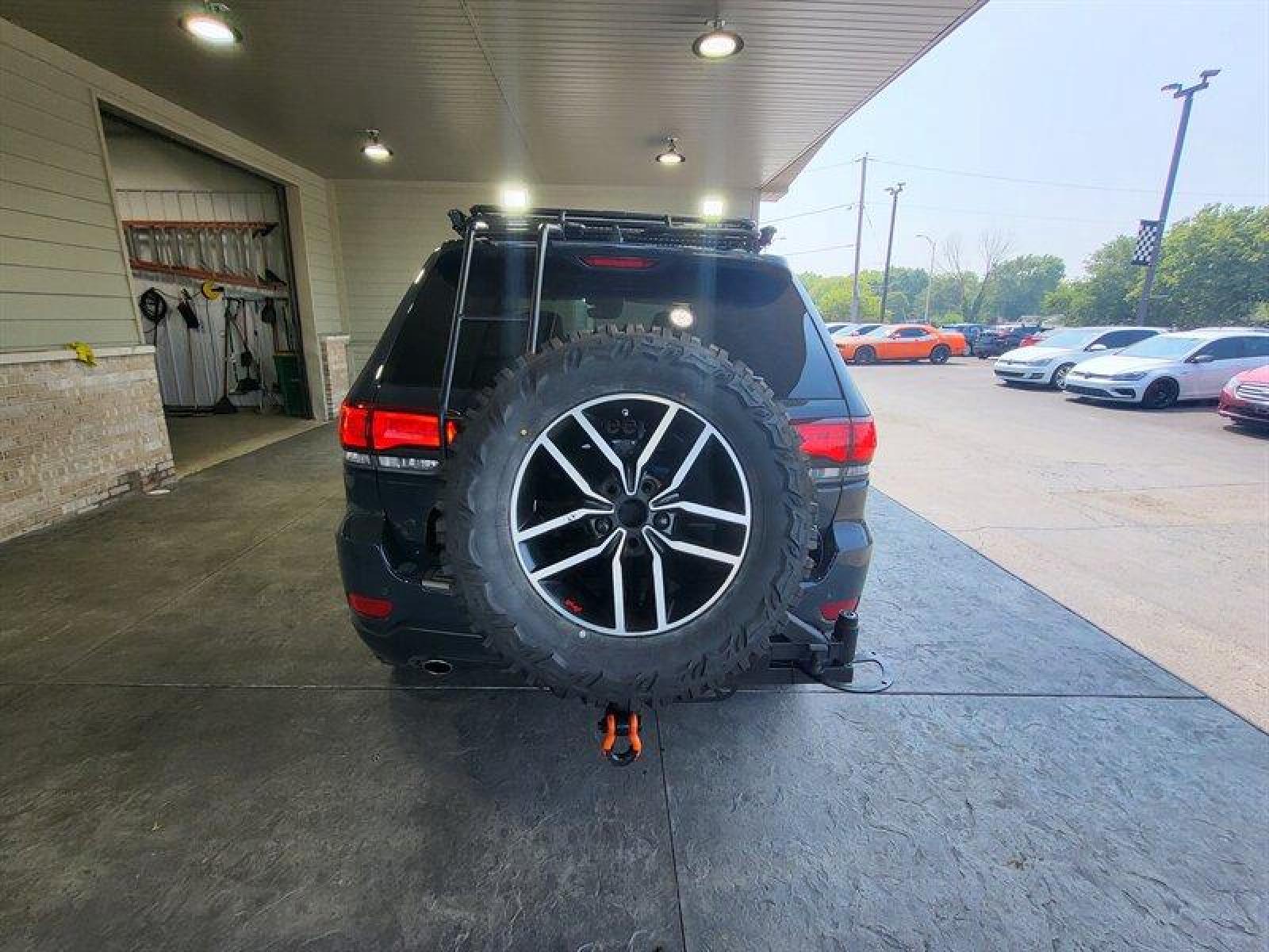 2018 Granite Crystal Metallic Clear Coat Jeep Grand Cherokee Trailhawk (1C4RJFLG3JC) with an Pentastar 3.6L V6 29 engine, Automatic transmission, located at 25355 Eames Street, Channahon, IL, 60410, (815) 467-1807, 41.429108, -88.228432 - ** WOW LOOK AT THIS JEEP, WELL OVER $7,000 IN UPGRADES. 6 MONKEYS TIRE SWING, GOBI STEALTH RACK AND LADDER, ARB COMBINATION BUMPER, WARN M8000 WINCH, PLUS MUCH MORE. 5 BRAND NEW TIRES AS WELL. ** If you're ready for a different, no hassle and pleasant car buying experience, then give us a chance! We - Photo #8