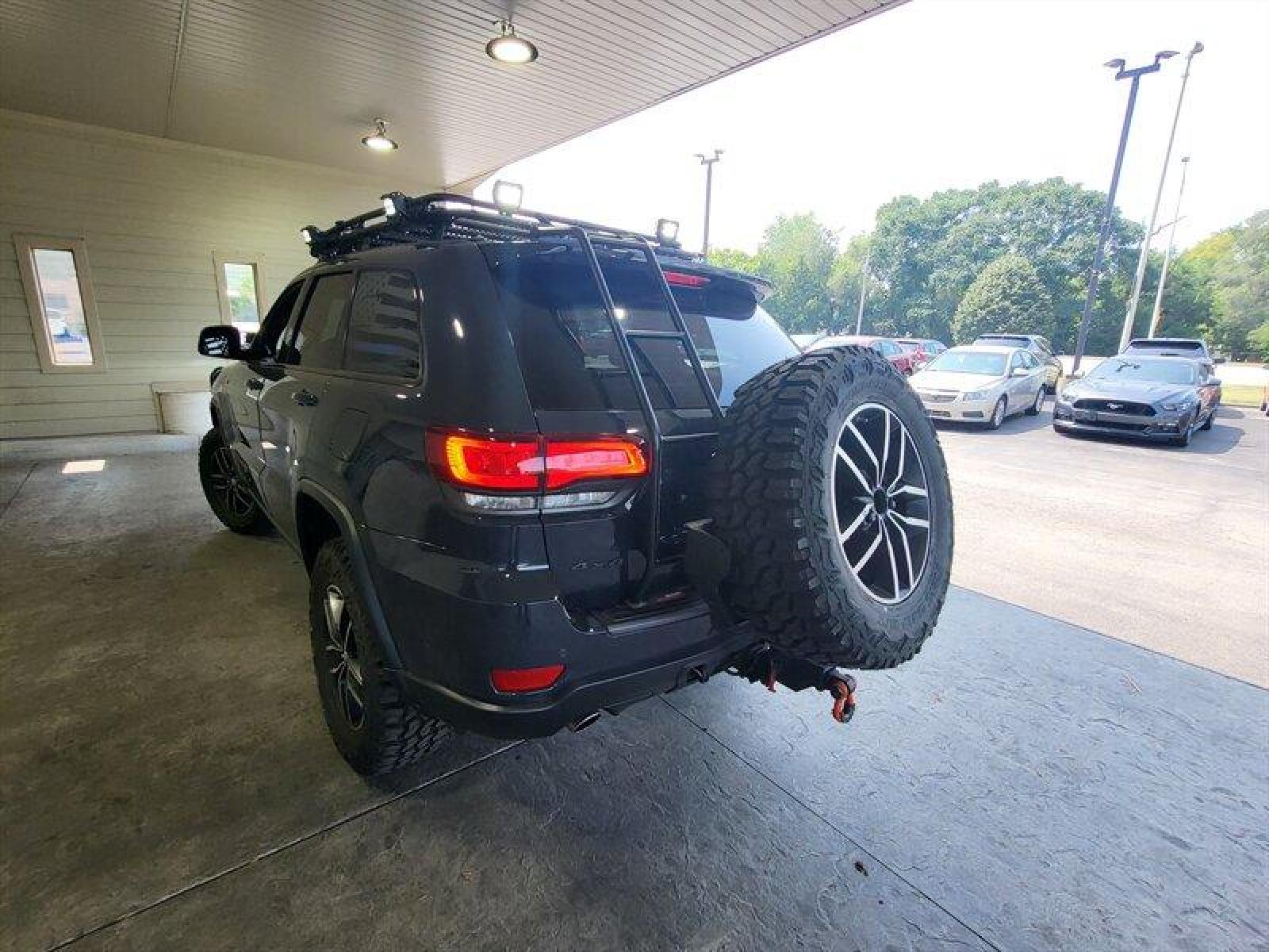 2018 Granite Crystal Metallic Clear Coat Jeep Grand Cherokee Trailhawk (1C4RJFLG3JC) with an Pentastar 3.6L V6 29 engine, Automatic transmission, located at 25355 Eames Street, Channahon, IL, 60410, (815) 467-1807, 41.429108, -88.228432 - ** WOW LOOK AT THIS JEEP, WELL OVER $7,000 IN UPGRADES. 6 MONKEYS TIRE SWING, GOBI STEALTH RACK AND LADDER, ARB COMBINATION BUMPER, WARN M8000 WINCH, PLUS MUCH MORE. 5 BRAND NEW TIRES AS WELL. ** If you're ready for a different, no hassle and pleasant car buying experience, then give us a chance! We - Photo #9