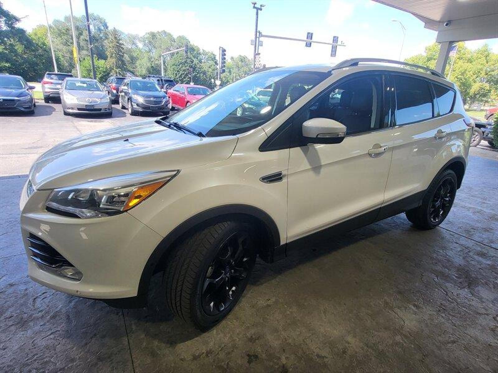 2014 White Platinum Metallic Tri-Coat Ford Escape Titanium (1FMCU0JX2EU) with an EcoBoost 1.6L Turbo I4 178hp 184ft. lbs. engine, Automatic transmission, located at 25355 Eames Street, Channahon, IL, 60410, (815) 467-1807, 41.429108, -88.228432 - ** AUTO PARK, LEATHER, AND MUCH MORE. ** * MONTH/3,000 MILE CPO WARANTY INCLUDED* If you're ready for a different, no hassle and pleasant car buying experience, then give us a chance! We're breaking the standard Car Sales mold and making one of our very own you'll be sure to appreciate! So, why buy - Photo #12