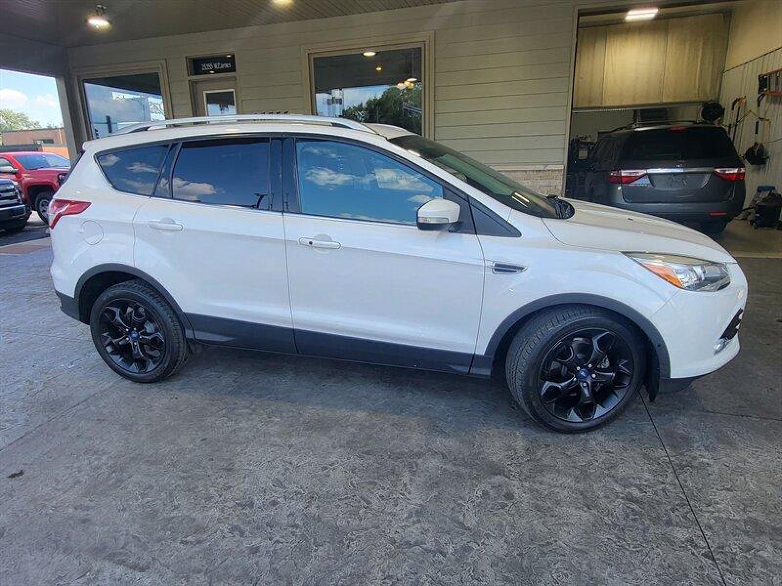 2014 White Platinum Metallic Tri-Coat Ford Escape Titanium (1FMCU0JX2EU) with an EcoBoost 1.6L Turbo I4 178hp 184ft. lbs. engine, Automatic transmission, located at 25355 Eames Street, Channahon, IL, 60410, (815) 467-1807, 41.429108, -88.228432 - ** AUTO PARK, LEATHER, AND MUCH MORE. ** * MONTH/3,000 MILE CPO WARANTY INCLUDED* If you're ready for a different, no hassle and pleasant car buying experience, then give us a chance! We're breaking the standard Car Sales mold and making one of our very own you'll be sure to appreciate! So, why buy - Photo #2