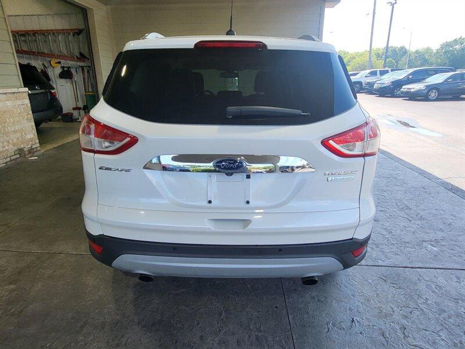 2014 White Platinum Metallic Tri-Coat Ford Escape Titanium (1FMCU0JX2EU) with an EcoBoost 1.6L Turbo I4 178hp 184ft. lbs. engine, Automatic transmission, located at 25355 Eames Street, Channahon, IL, 60410, (815) 467-1807, 41.429108, -88.228432 - ** AUTO PARK, LEATHER, AND MUCH MORE. ** * MONTH/3,000 MILE CPO WARANTY INCLUDED* If you're ready for a different, no hassle and pleasant car buying experience, then give us a chance! We're breaking the standard Car Sales mold and making one of our very own you'll be sure to appreciate! So, why buy - Photo #7