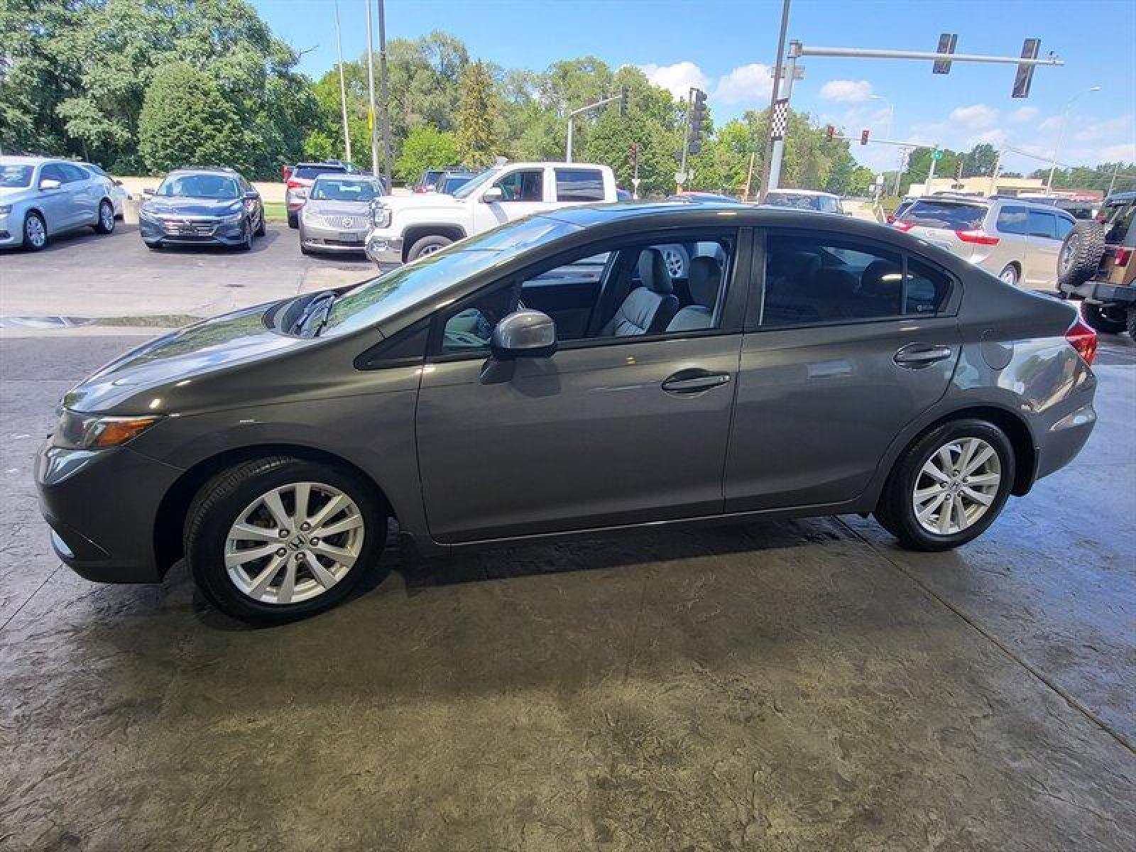 2012 Urban Titanium Metallic Honda Civic EX-L (2HGFB2F94CH) with an 1.8L I4 140hp 128ft. lbs. engine, Automatic transmission, located at 25355 Eames Street, Channahon, IL, 60410, (815) 467-1807, 41.429108, -88.228432 - ** WOW ONLY 23,000 MILES ** *CPO 3 MONTH/3,000 MILE WARRANTY INCLUDED* If you're ready for a different, no hassle and pleasant car buying experience, then give us a chance! We're breaking the standard Car Sales mold and making one of our very own you'll be sure to appreciate! So, why buy from Crase - Photo #11