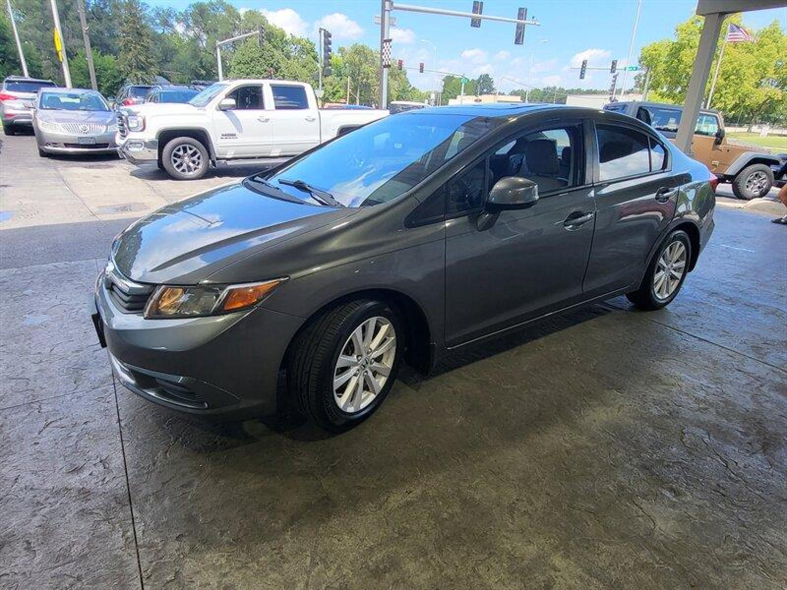 2012 Urban Titanium Metallic Honda Civic EX-L (2HGFB2F94CH) with an 1.8L I4 140hp 128ft. lbs. engine, Automatic transmission, located at 25355 Eames Street, Channahon, IL, 60410, (815) 467-1807, 41.429108, -88.228432 - ** WOW ONLY 23,000 MILES ** *CPO 3 MONTH/3,000 MILE WARRANTY INCLUDED* If you're ready for a different, no hassle and pleasant car buying experience, then give us a chance! We're breaking the standard Car Sales mold and making one of our very own you'll be sure to appreciate! So, why buy from Crase - Photo #12