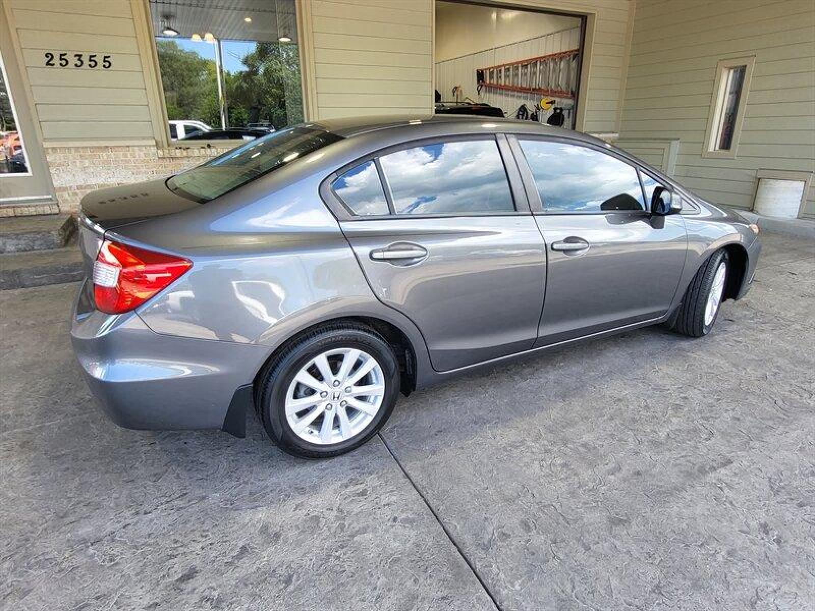 2012 Urban Titanium Metallic Honda Civic EX-L (2HGFB2F94CH) with an 1.8L I4 140hp 128ft. lbs. engine, Automatic transmission, located at 25355 Eames Street, Channahon, IL, 60410, (815) 467-1807, 41.429108, -88.228432 - ** WOW ONLY 23,000 MILES ** *CPO 3 MONTH/3,000 MILE WARRANTY INCLUDED* If you're ready for a different, no hassle and pleasant car buying experience, then give us a chance! We're breaking the standard Car Sales mold and making one of our very own you'll be sure to appreciate! So, why buy from Crase - Photo #5