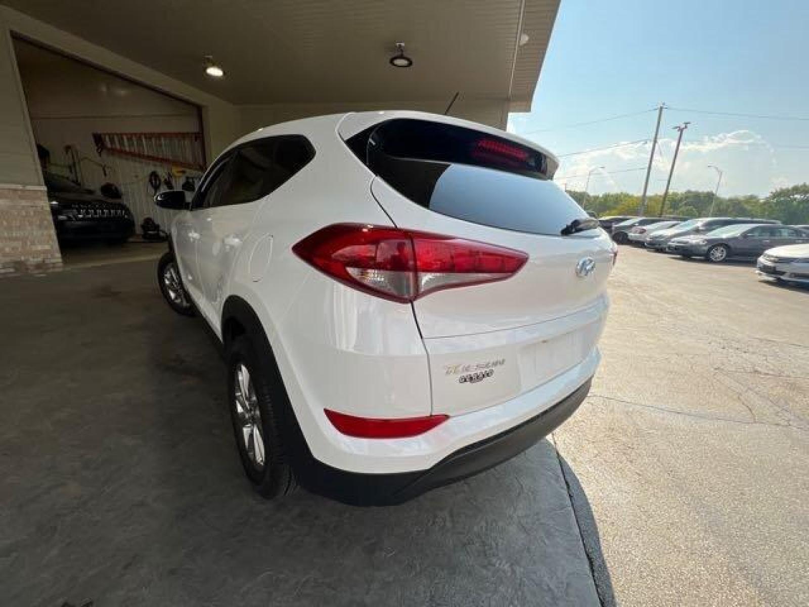 2018 Dazzling White Hyundai Tucson SE (KM8J23A42JU) with an 2.0L I4 164hp 151ft. lbs. engine, Automatic transmission, located at 25355 Eames Street, Channahon, IL, 60410, (815) 467-1807, 41.429108, -88.228432 - CLEAN LOCAL TRADE! BACK UP CAMERA! If you're ready for a different, no hassle and pleasant car buying experience, then give us a chance! We're breaking the standard Car Sales mold and making one of our very own you'll be sure to appreciate! So, why buy from Crase Auto Connection? Here's a simple ans - Photo #5