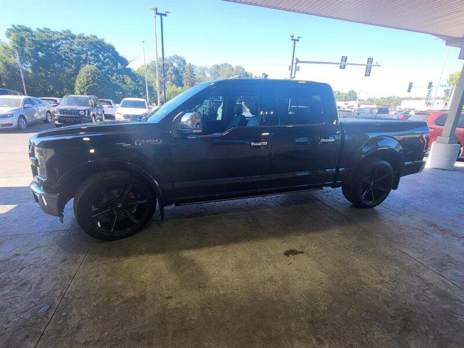 2015 Tuxedo Black Metallic Ford F-150 Lariat (1FTEW1EF9FF) with an 5.0L Flex Fuel V8 385hp 387ft. lbs. engine, Automatic transmission, located at 25355 Eames Street, Channahon, IL, 60410, (815) 467-1807, 41.429108, -88.228432 - ** LOWERED, ADJUSTABLE AIR LIFT SUSPENSION, SCT PROGRAMMER, NICE CLEAN TRUCK. ** If you're ready for a different, no hassle and pleasant car buying experience, then give us a chance! We're breaking the standard Car Sales mold and making one of our very own you'll be sure to appreciate! So, why buy - Photo #13