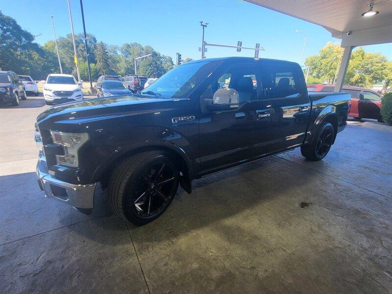 2015 Tuxedo Black Metallic Ford F-150 Lariat (1FTEW1EF9FF) with an 5.0L Flex Fuel V8 385hp 387ft. lbs. engine, Automatic transmission, located at 25355 Eames Street, Channahon, IL, 60410, (815) 467-1807, 41.429108, -88.228432 - ** LOWERED, ADJUSTABLE AIR LIFT SUSPENSION, SCT PROGRAMMER, NICE CLEAN TRUCK. ** If you're ready for a different, no hassle and pleasant car buying experience, then give us a chance! We're breaking the standard Car Sales mold and making one of our very own you'll be sure to appreciate! So, why buy - Photo #14