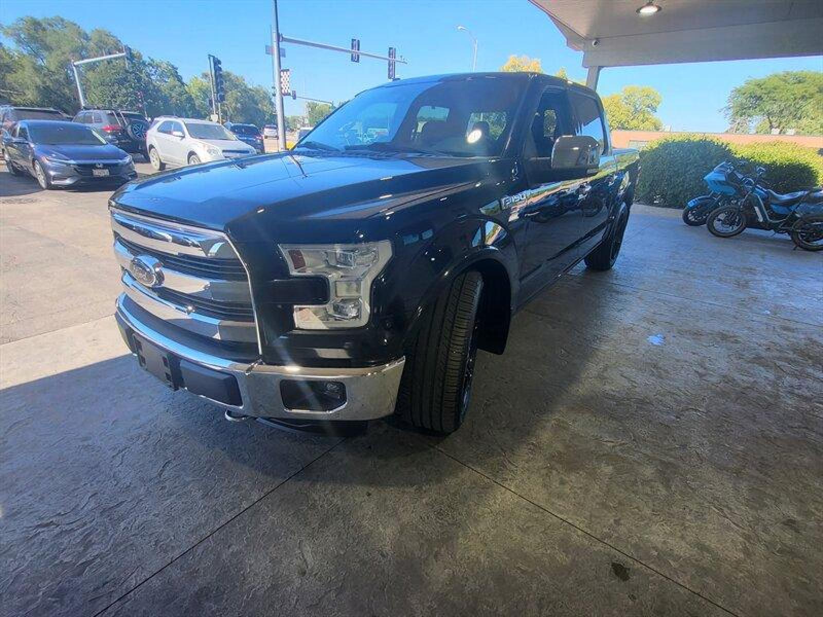 2015 Tuxedo Black Metallic Ford F-150 Lariat (1FTEW1EF9FF) with an 5.0L Flex Fuel V8 385hp 387ft. lbs. engine, Automatic transmission, located at 25355 Eames Street, Channahon, IL, 60410, (815) 467-1807, 41.429108, -88.228432 - ** LOWERED, ADJUSTABLE AIR LIFT SUSPENSION, SCT PROGRAMMER, NICE CLEAN TRUCK. ** If you're ready for a different, no hassle and pleasant car buying experience, then give us a chance! We're breaking the standard Car Sales mold and making one of our very own you'll be sure to appreciate! So, why buy - Photo #16