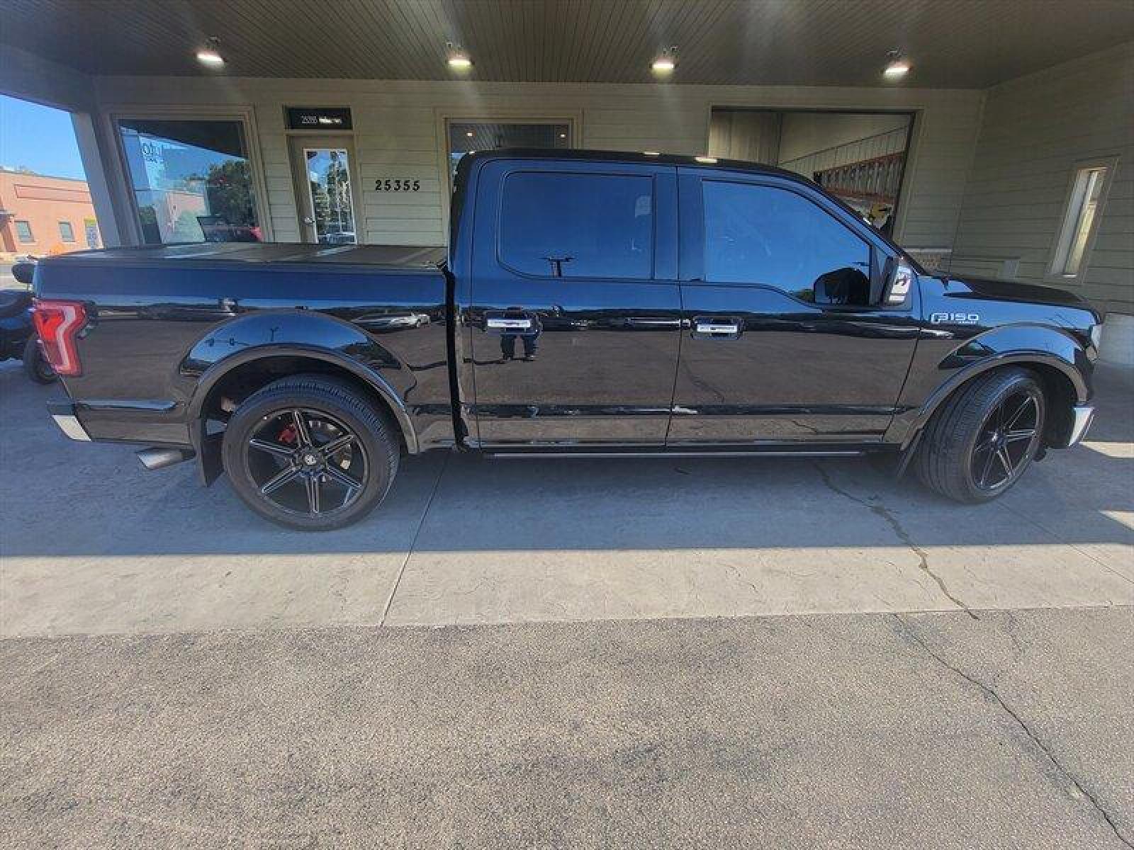 2015 Tuxedo Black Metallic Ford F-150 Lariat (1FTEW1EF9FF) with an 5.0L Flex Fuel V8 385hp 387ft. lbs. engine, Automatic transmission, located at 25355 Eames Street, Channahon, IL, 60410, (815) 467-1807, 41.429108, -88.228432 - ** LOWERED, ADJUSTABLE AIR LIFT SUSPENSION, SCT PROGRAMMER, NICE CLEAN TRUCK. ** If you're ready for a different, no hassle and pleasant car buying experience, then give us a chance! We're breaking the standard Car Sales mold and making one of our very own you'll be sure to appreciate! So, why buy - Photo #4