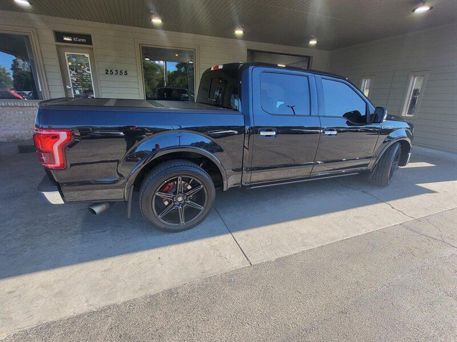 2015 Tuxedo Black Metallic Ford F-150 Lariat (1FTEW1EF9FF) with an 5.0L Flex Fuel V8 385hp 387ft. lbs. engine, Automatic transmission, located at 25355 Eames Street, Channahon, IL, 60410, (815) 467-1807, 41.429108, -88.228432 - ** LOWERED, ADJUSTABLE AIR LIFT SUSPENSION, SCT PROGRAMMER, NICE CLEAN TRUCK. ** If you're ready for a different, no hassle and pleasant car buying experience, then give us a chance! We're breaking the standard Car Sales mold and making one of our very own you'll be sure to appreciate! So, why buy - Photo #5