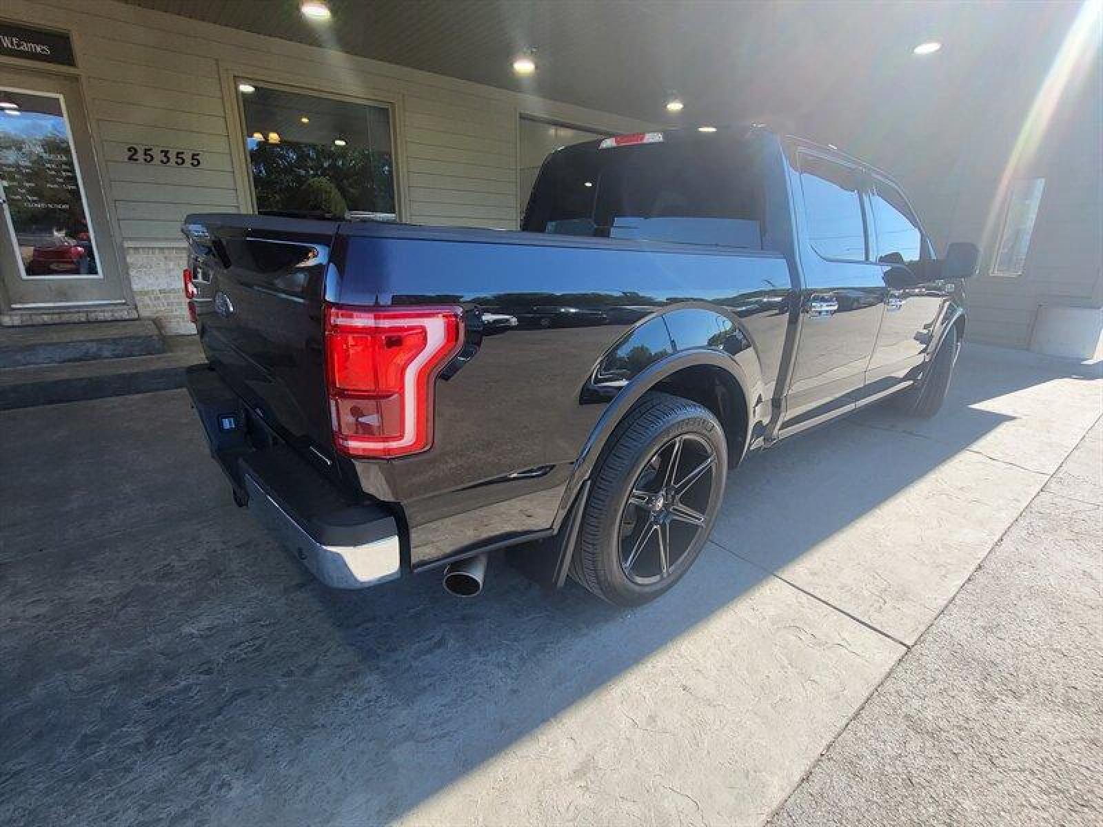 2015 Tuxedo Black Metallic Ford F-150 Lariat (1FTEW1EF9FF) with an 5.0L Flex Fuel V8 385hp 387ft. lbs. engine, Automatic transmission, located at 25355 Eames Street, Channahon, IL, 60410, (815) 467-1807, 41.429108, -88.228432 - ** LOWERED, ADJUSTABLE AIR LIFT SUSPENSION, SCT PROGRAMMER, NICE CLEAN TRUCK. ** If you're ready for a different, no hassle and pleasant car buying experience, then give us a chance! We're breaking the standard Car Sales mold and making one of our very own you'll be sure to appreciate! So, why buy - Photo #6