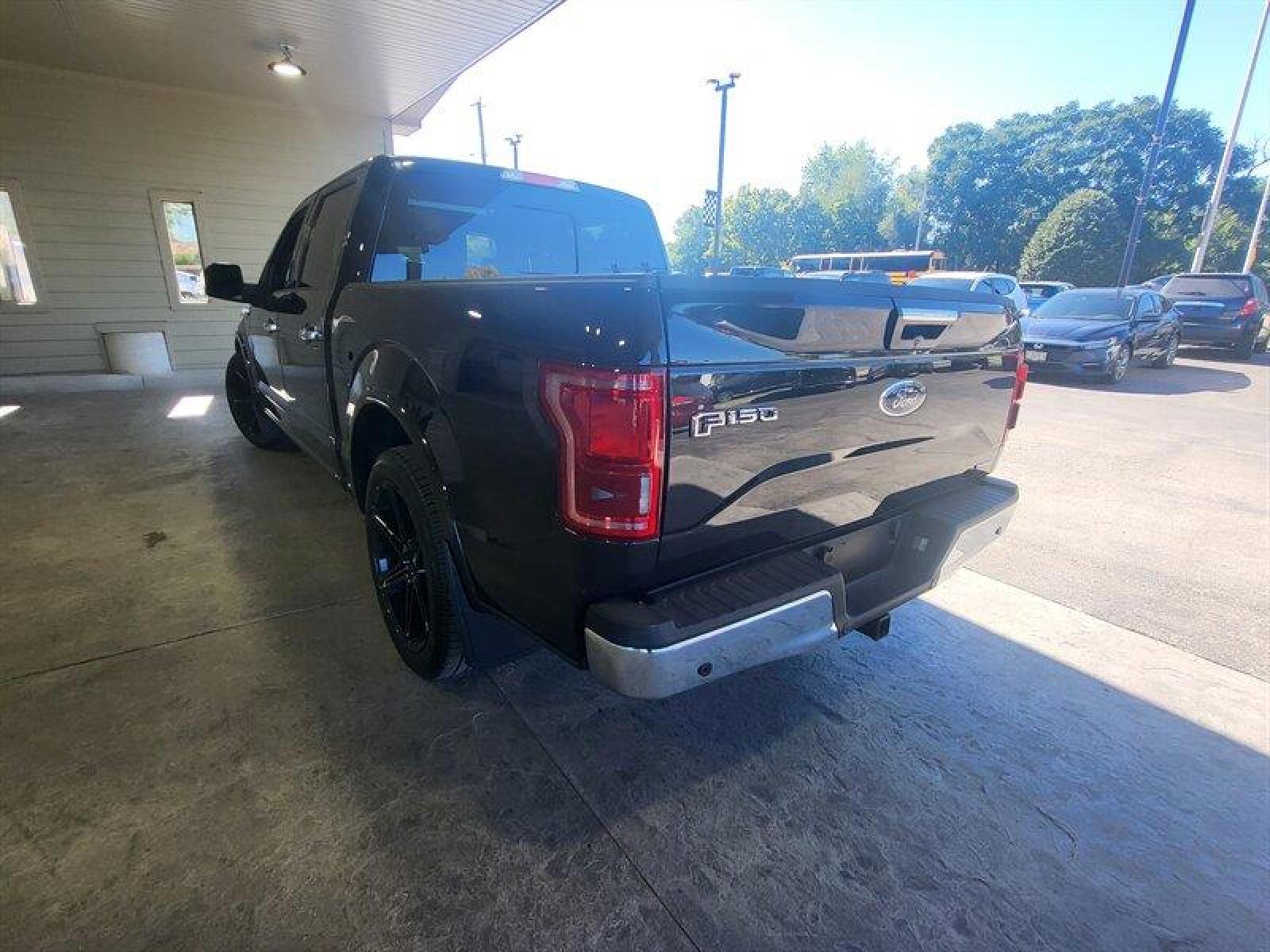 2015 Tuxedo Black Metallic Ford F-150 Lariat (1FTEW1EF9FF) with an 5.0L Flex Fuel V8 385hp 387ft. lbs. engine, Automatic transmission, located at 25355 Eames Street, Channahon, IL, 60410, (815) 467-1807, 41.429108, -88.228432 - ** LOWERED, ADJUSTABLE AIR LIFT SUSPENSION, SCT PROGRAMMER, NICE CLEAN TRUCK. ** If you're ready for a different, no hassle and pleasant car buying experience, then give us a chance! We're breaking the standard Car Sales mold and making one of our very own you'll be sure to appreciate! So, why buy - Photo #9