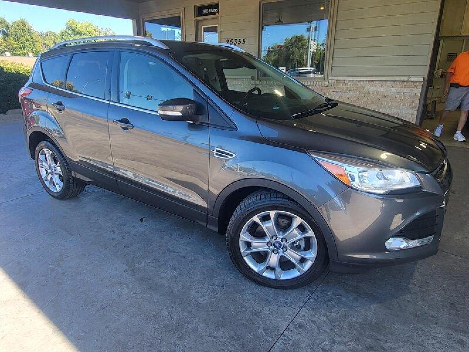 2015 Magnetic Metallic Ford Escape Titanium (1FMCU0J9XFU) with an EcoBoost 2.0L Turbo I4 240hp 270ft. lbs. engine, Automatic transmission, located at 25355 Eames Street, Channahon, IL, 60410, (815) 467-1807, 41.429108, -88.228432 - CLEAN LOCAL TRADE! *CPO 3 MONTH/3,000 MILE WARRANTY INCLUDED* If you're ready for a different, no hassle and pleasant car buying experience, then give us a chance! We're breaking the standard Car Sales mold and making one of our very own you'll be sure to appreciate! So, why buy from Crase Auto Conn - Photo #2