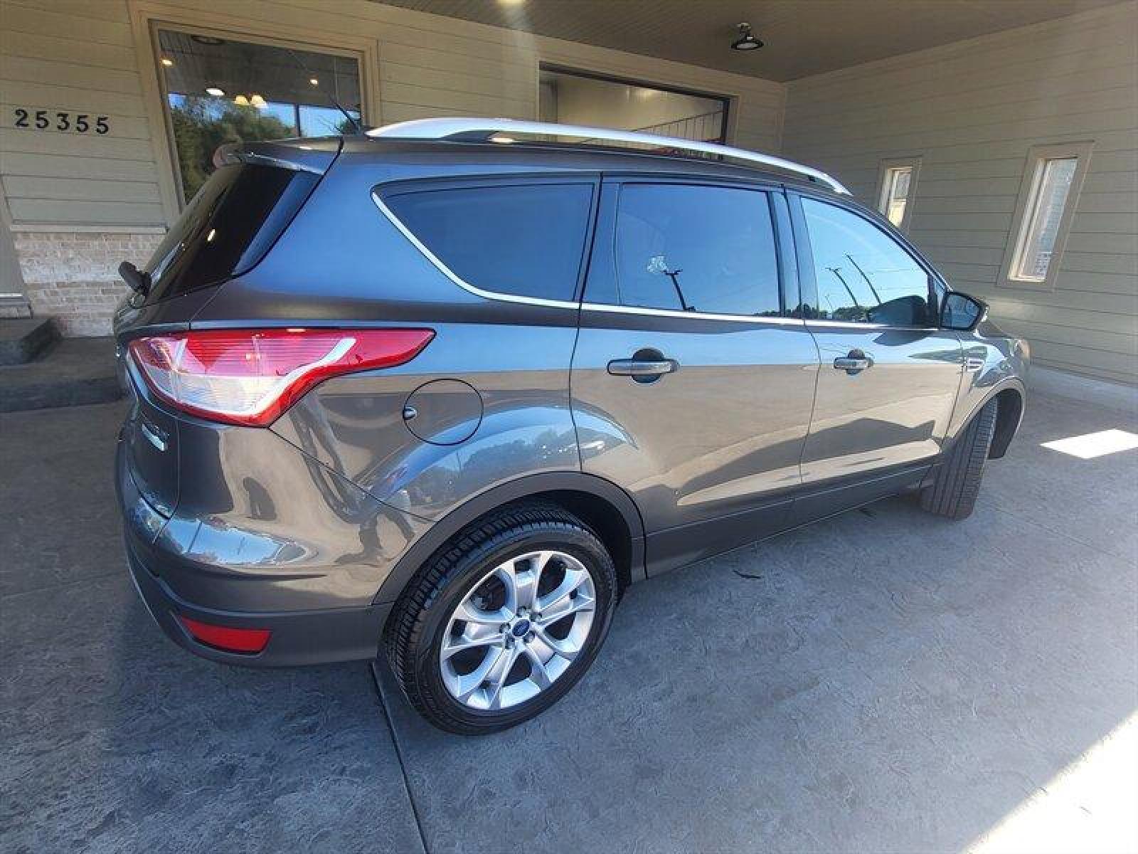 2015 Magnetic Metallic Ford Escape Titanium (1FMCU0J9XFU) with an EcoBoost 2.0L Turbo I4 240hp 270ft. lbs. engine, Automatic transmission, located at 25355 Eames Street, Channahon, IL, 60410, (815) 467-1807, 41.429108, -88.228432 - CLEAN LOCAL TRADE! *CPO 3 MONTH/3,000 MILE WARRANTY INCLUDED* If you're ready for a different, no hassle and pleasant car buying experience, then give us a chance! We're breaking the standard Car Sales mold and making one of our very own you'll be sure to appreciate! So, why buy from Crase Auto Conn - Photo #6
