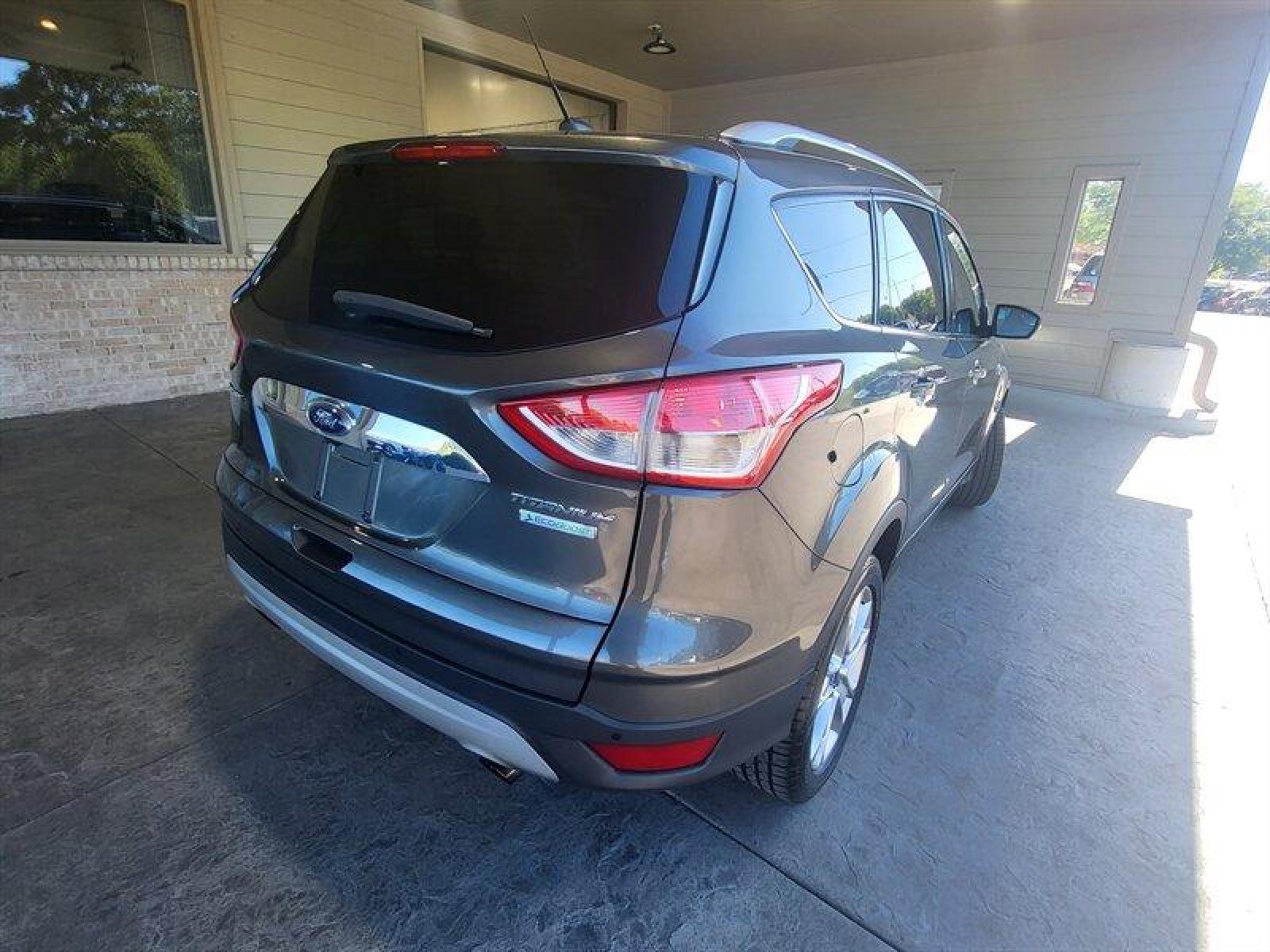 2015 Magnetic Metallic Ford Escape Titanium (1FMCU0J9XFU) with an EcoBoost 2.0L Turbo I4 240hp 270ft. lbs. engine, Automatic transmission, located at 25355 Eames Street, Channahon, IL, 60410, (815) 467-1807, 41.429108, -88.228432 - CLEAN LOCAL TRADE! *CPO 3 MONTH/3,000 MILE WARRANTY INCLUDED* If you're ready for a different, no hassle and pleasant car buying experience, then give us a chance! We're breaking the standard Car Sales mold and making one of our very own you'll be sure to appreciate! So, why buy from Crase Auto Conn - Photo #7