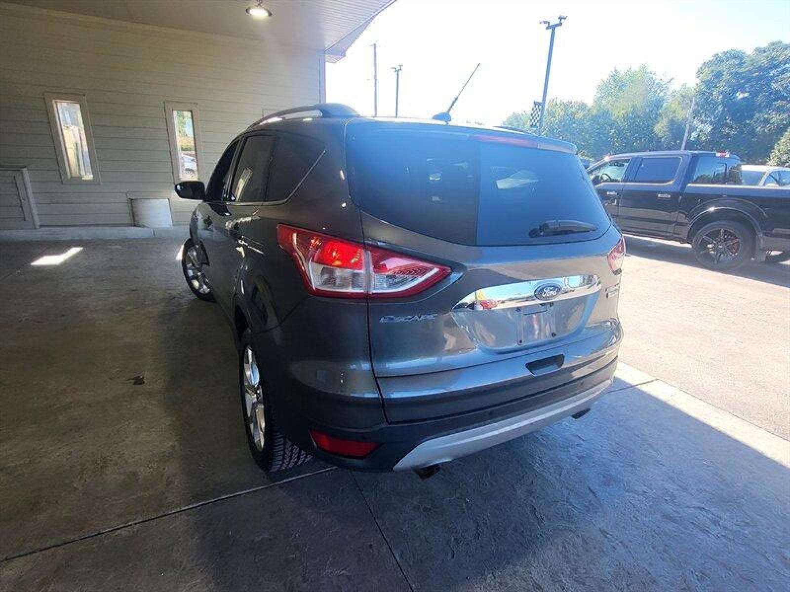 2015 Magnetic Metallic Ford Escape Titanium (1FMCU0J9XFU) with an EcoBoost 2.0L Turbo I4 240hp 270ft. lbs. engine, Automatic transmission, located at 25355 Eames Street, Channahon, IL, 60410, (815) 467-1807, 41.429108, -88.228432 - CLEAN LOCAL TRADE! *CPO 3 MONTH/3,000 MILE WARRANTY INCLUDED* If you're ready for a different, no hassle and pleasant car buying experience, then give us a chance! We're breaking the standard Car Sales mold and making one of our very own you'll be sure to appreciate! So, why buy from Crase Auto Conn - Photo #9